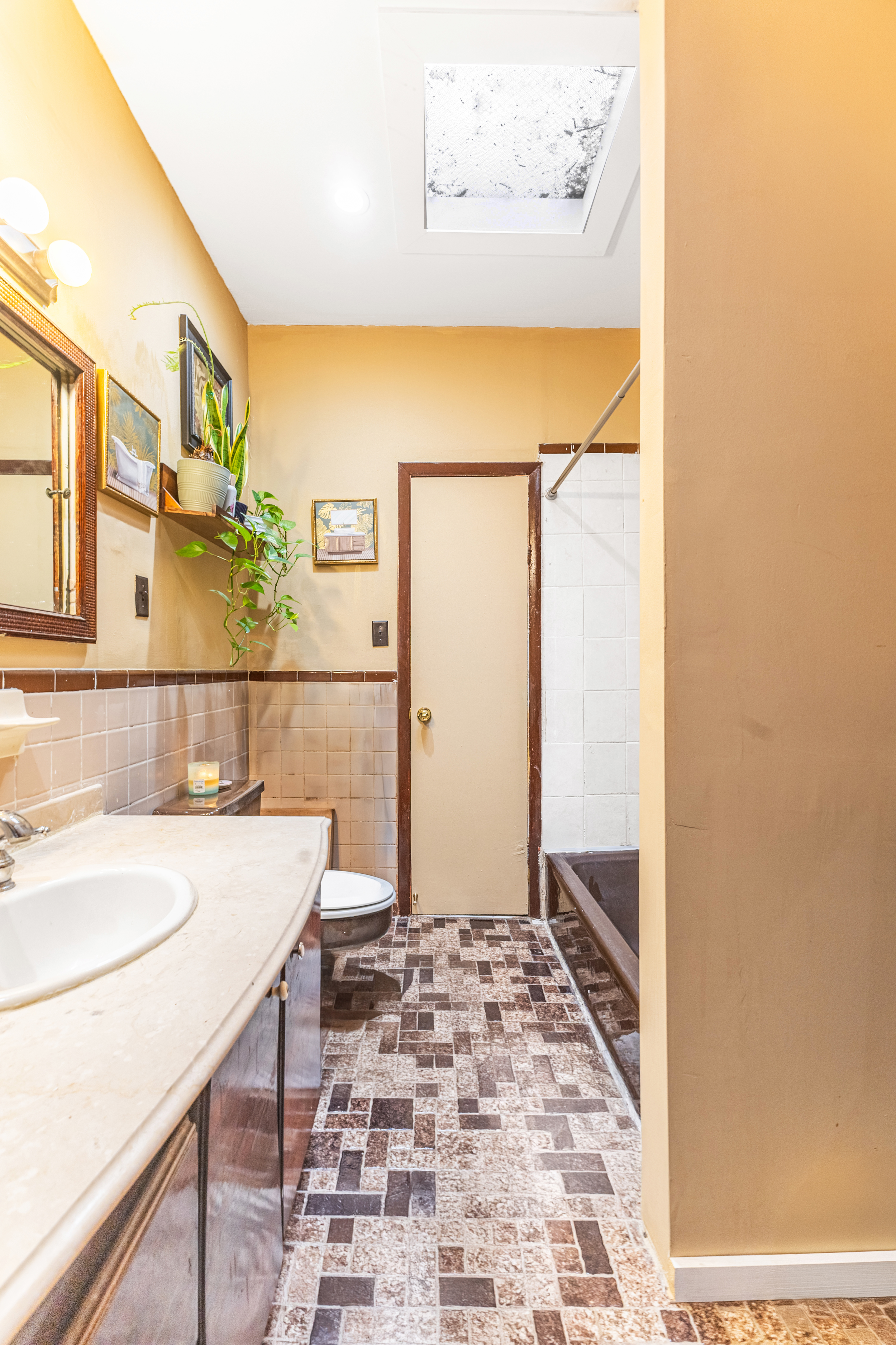 201 Maple Street Brooklyn, NY 11225 - Photo 13 of 21 a bathroom with a sink and a mirror