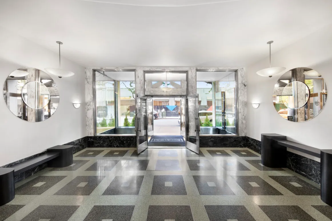 a living room with furniture fireplace and flat screen tv
