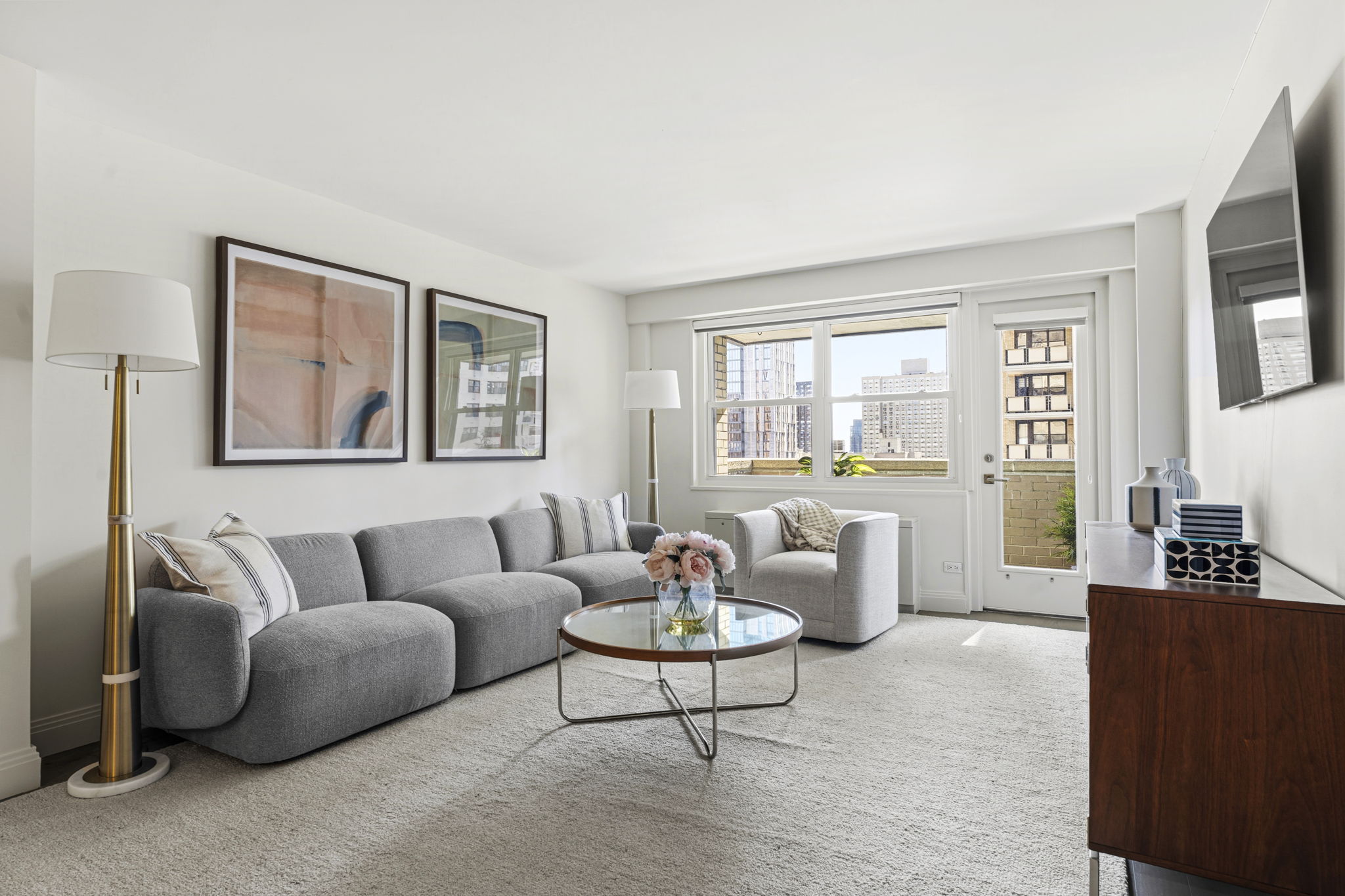a living room with furniture and a window