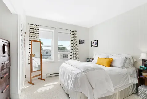 an aerial view of a city with lots of residential buildings