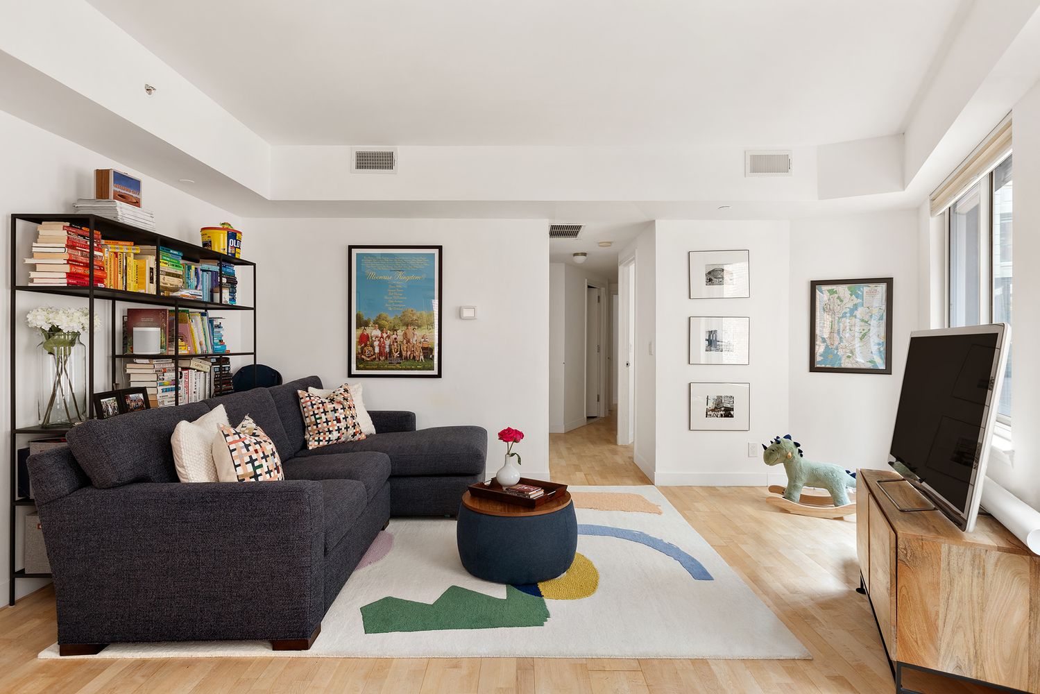 a living room with furniture or couch and a flat screen tv