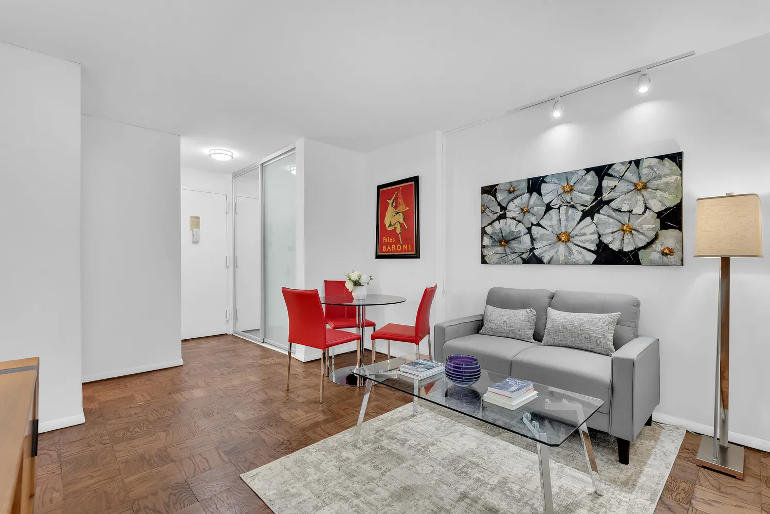 a living room with furniture and a rug