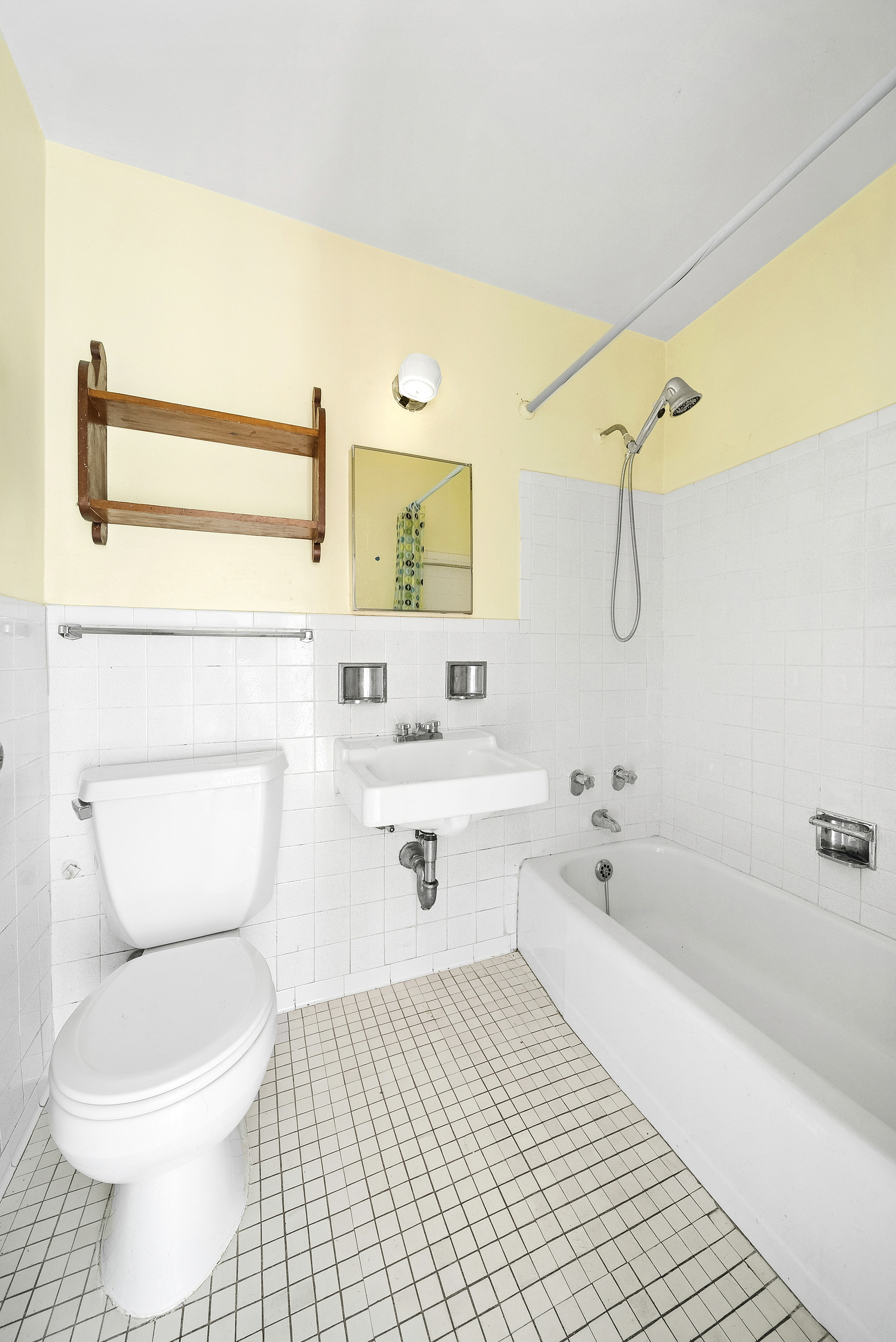 400 Central Park West, Unit 20B Manhattan, NY 10025 - Photo 8 of 11 a bathroom with a sink a toilet and shower