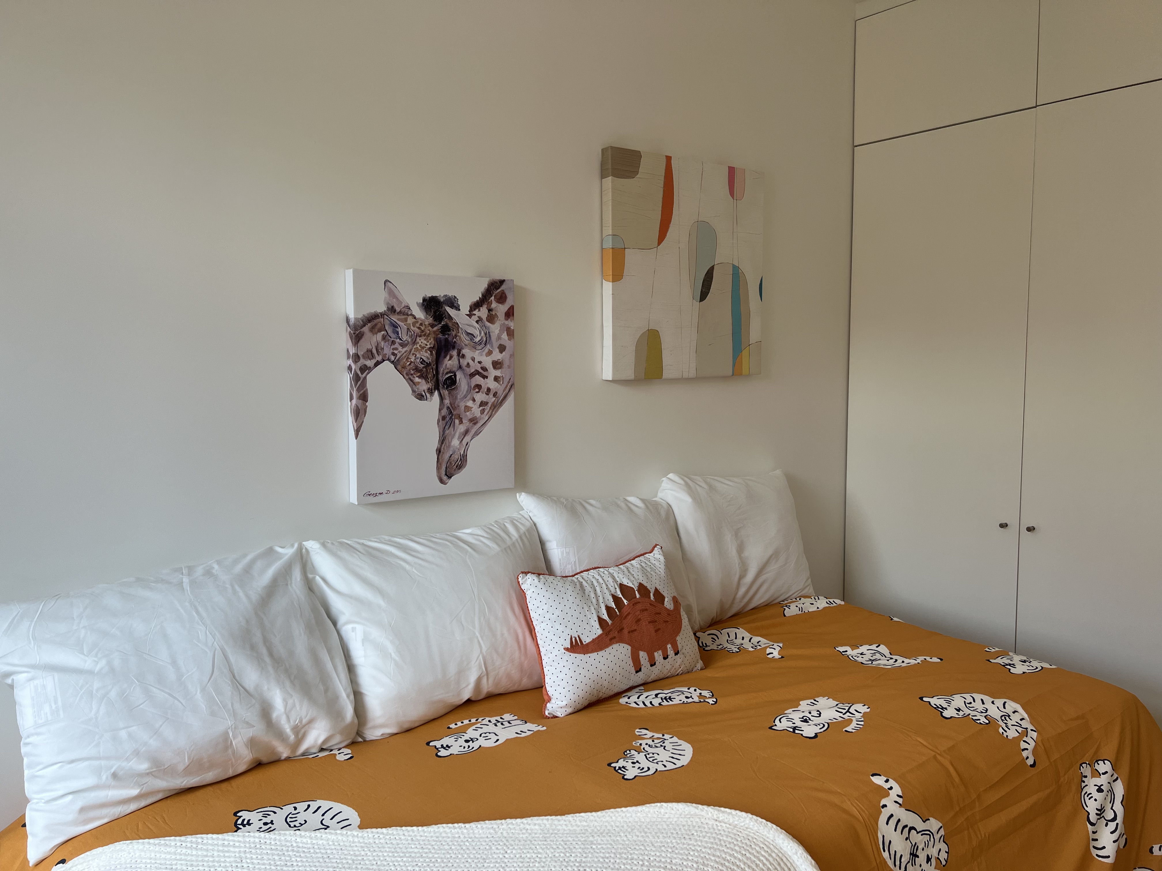 124 East 79th Street, Unit 7D Manhattan, NY 10075 - Photo 7 of 25 a bedroom with a bed and cupboard