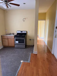a view of a hardwood floor in a room