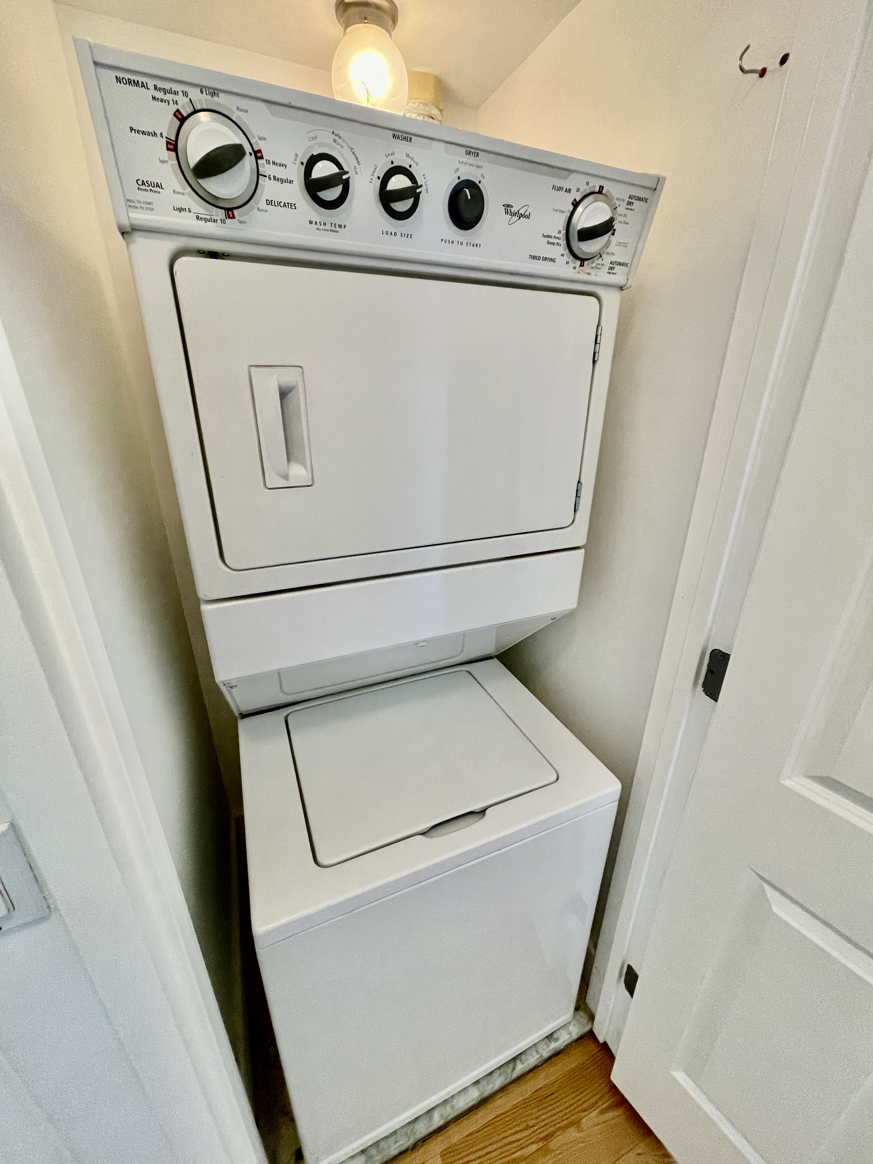 106 West 116th Street, Unit 12A Manhattan, NY 10026 - Photo 8 of 13 a utility room with dryer and washer