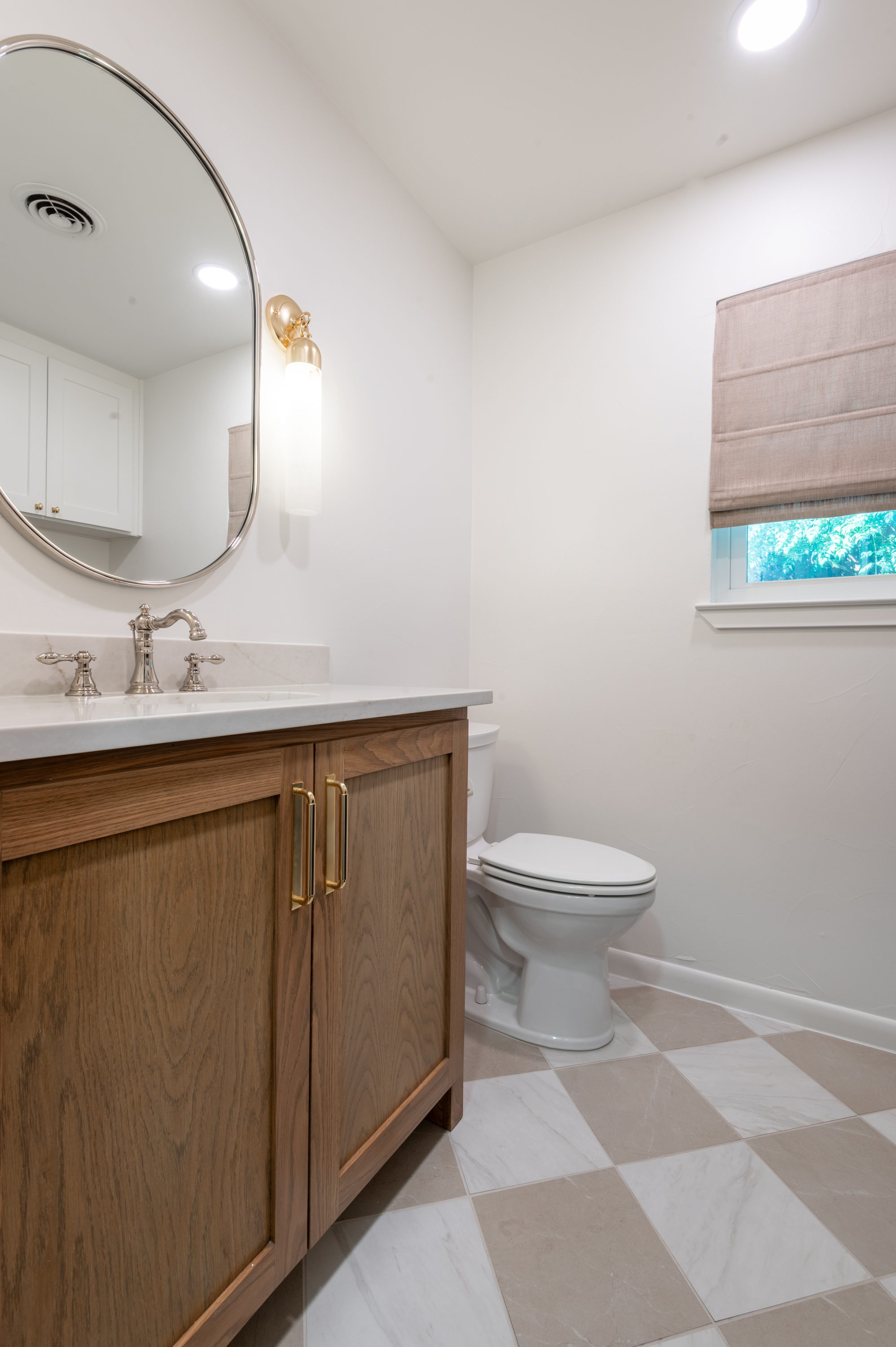 3363 Merrell Road Dallas, TX 75229 - Photo 26 of 29 a bathroom with a granite countertop toilet sink and mirror