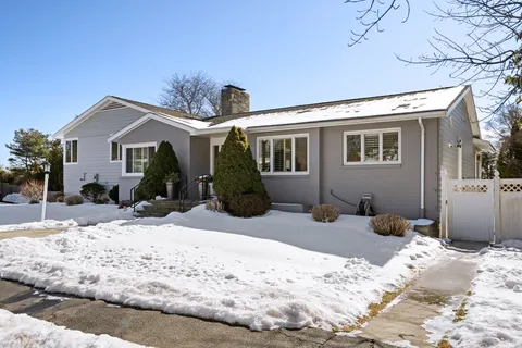 a view of a backyard of the house