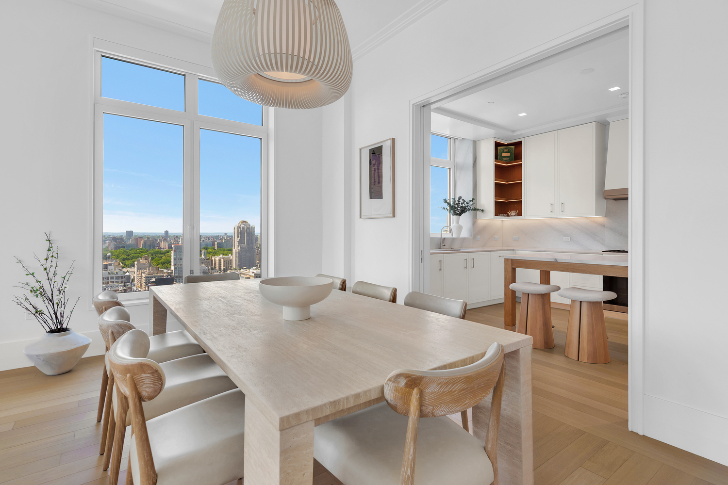 200 East 83rd Street, Unit 29B Manhattan, NY 10028 - Photo 3 of 20 a view of a dining room with furniture window and outside view