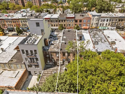 a view of a city with tall buildings