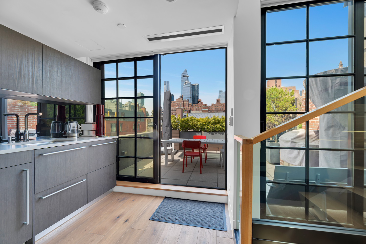 440 West 20th Street Manhattan, NY 10011 - Photo 5 of 35 a view of a kitchen with a window