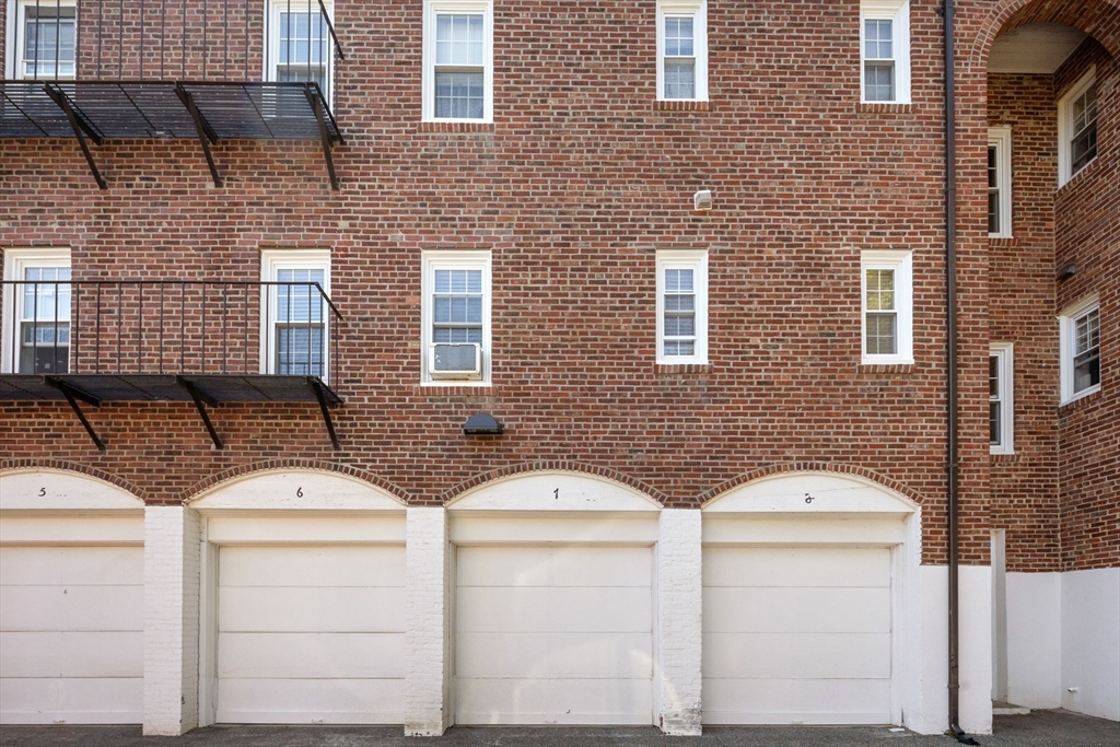 27-29 Commonwealth Avenue, Unit 9 Newton, MA 02467 - Photo 18 of 20 a couple of white and red brick building in front of a brick building
