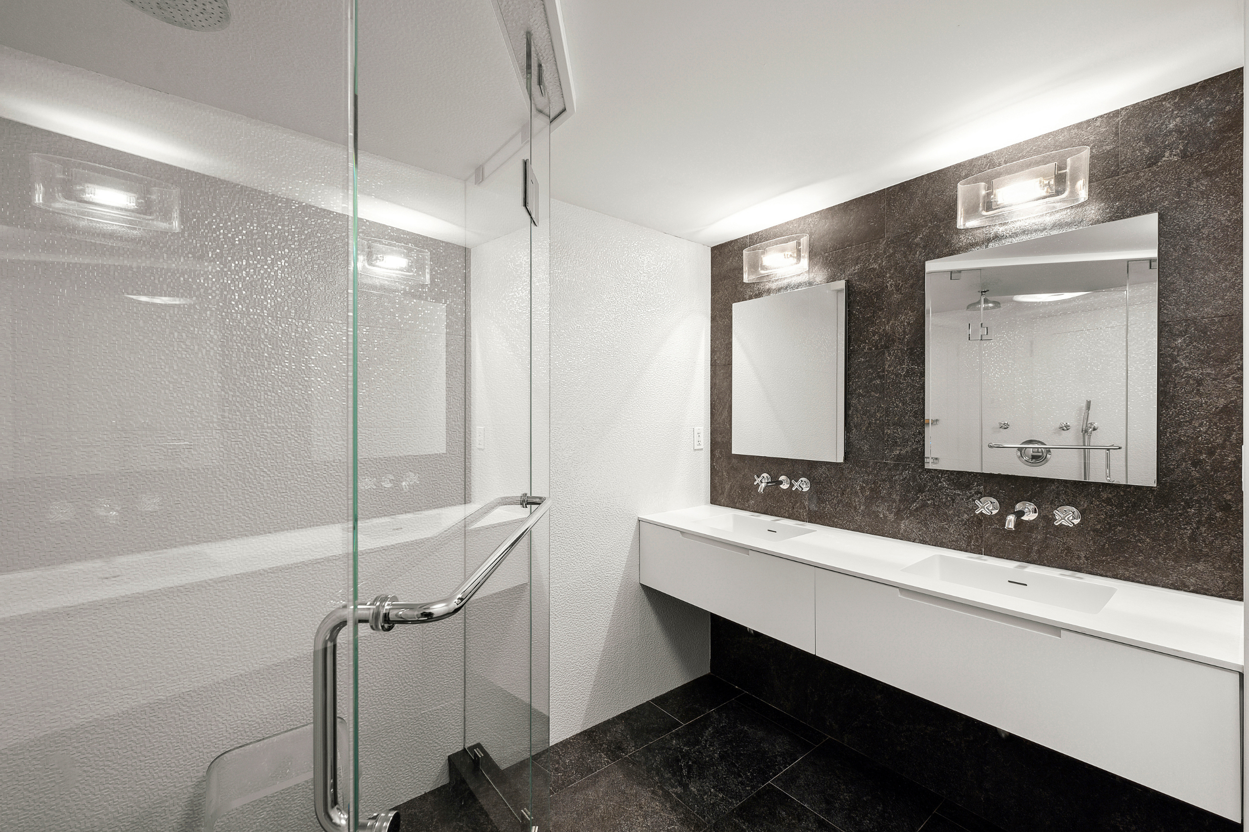 170 East 88th Street, Unit 1C Manhattan, NY 10128 - Photo 14 of 16 a bathroom with a double vanity sink mirror and double