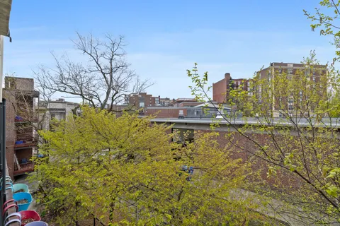 a view of a city with tall buildings
