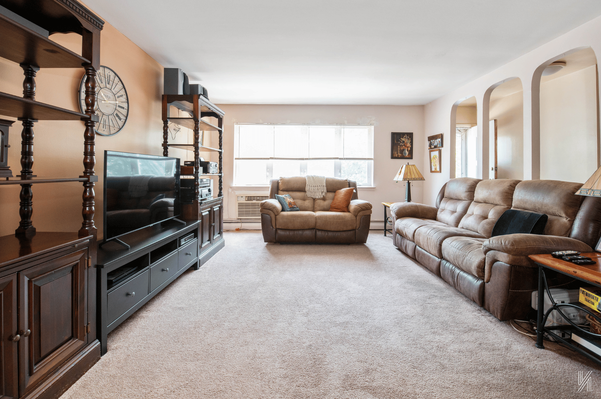 1148 East 73rd Street Brooklyn, NY 11234 - Photo 2 of 15 a living room with furniture and a flat screen tv