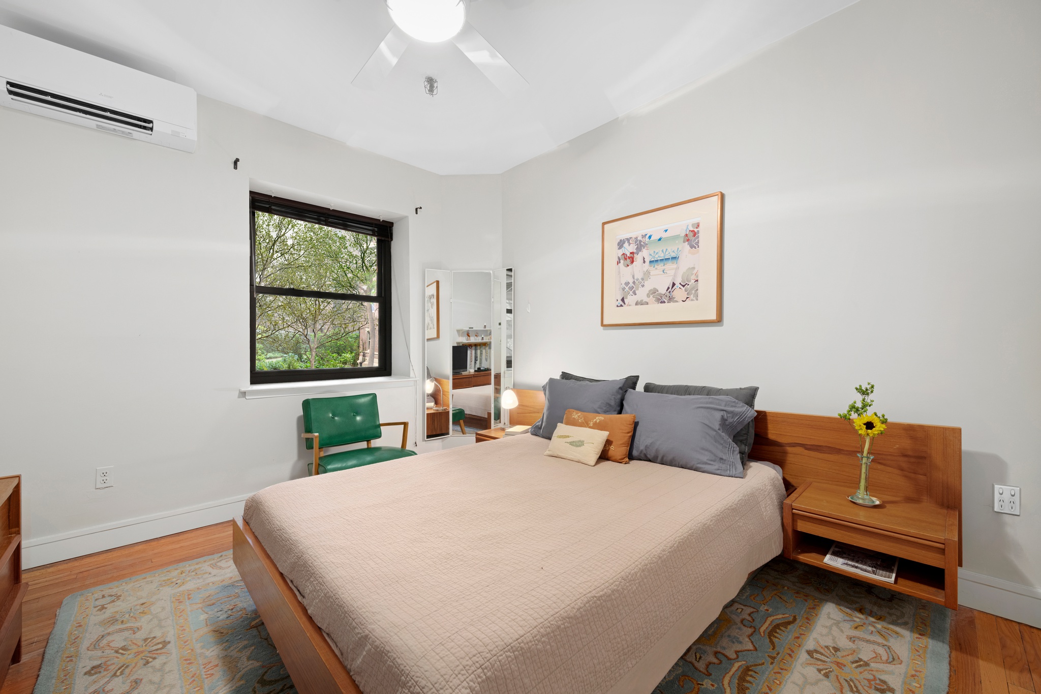 166 Bank Street, Unit LOFT2C Manhattan, NY 10014 - Photo 6 of 11 a bed room with a bed and a window