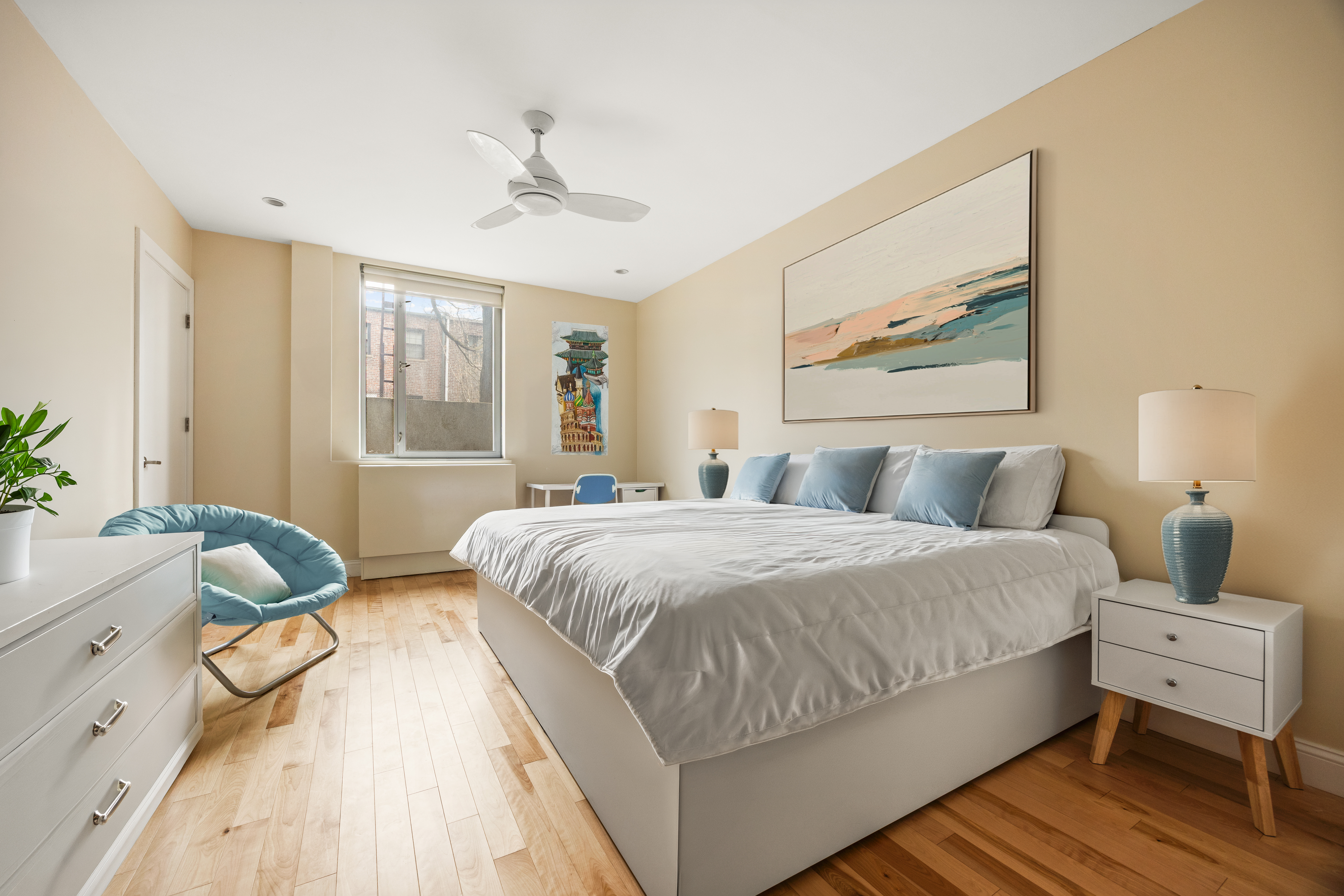 35 McDonald Avenue, Unit 1E Brooklyn, NY 11218 - Photo 5 of 9 a spacious bedroom with a bed and wooden floor