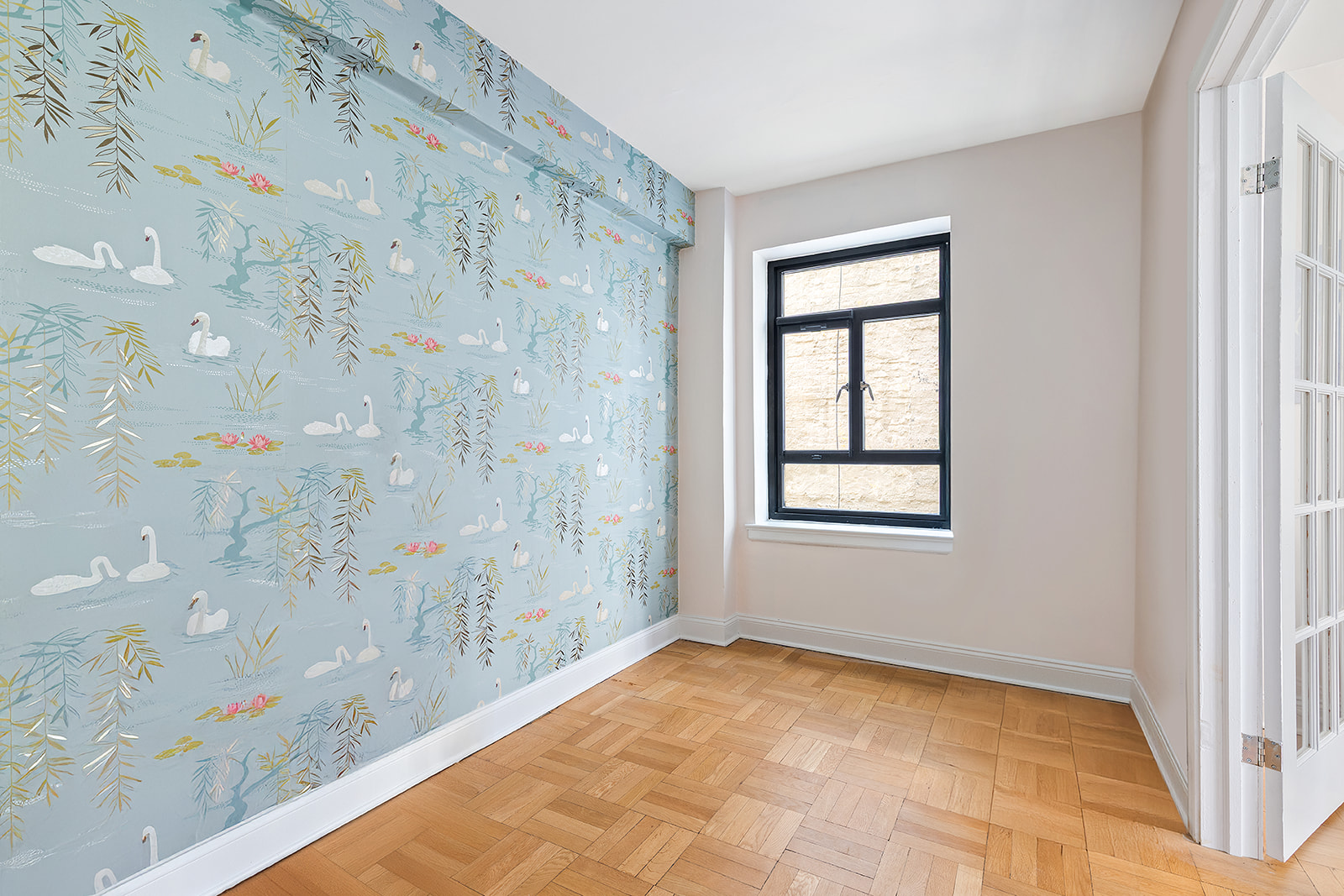 100 Remsen Street, Unit 3C Brooklyn, NY 11201 - Photo 3 of 10 a view of a big room with windows and chandelier fan
