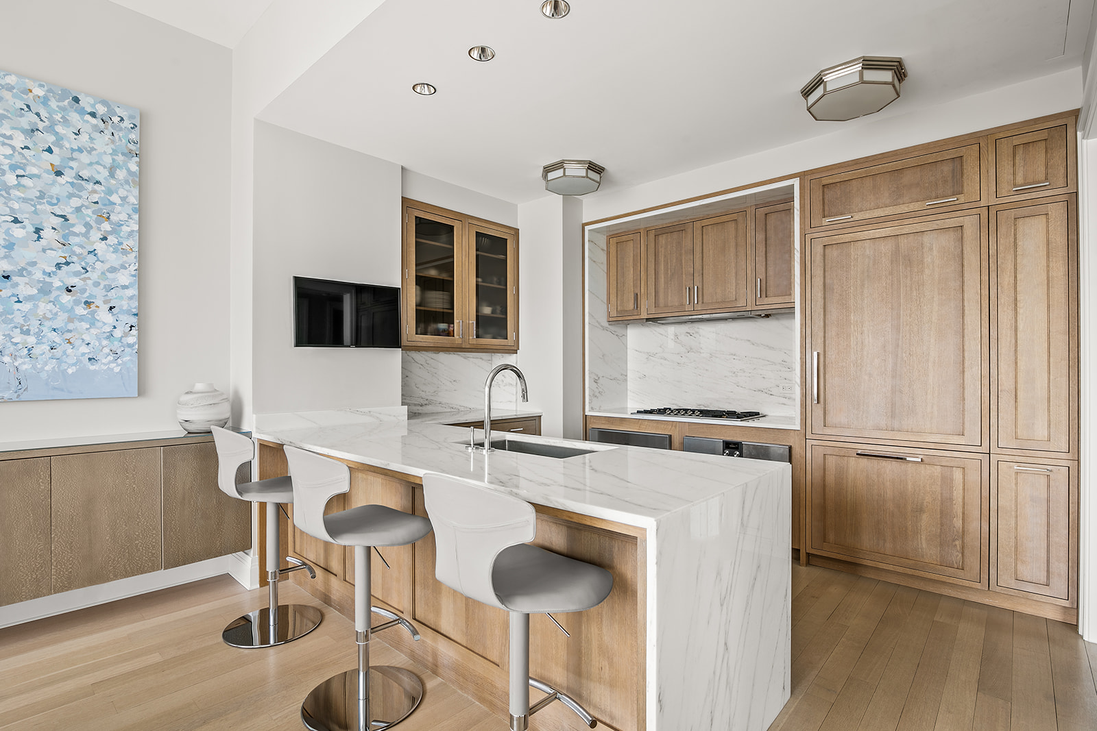 30 Park Place, Unit 43A Manhattan, NY 10007 - Photo 4 of 13 a kitchen with granite countertop a sink appliances cabinets and furniture