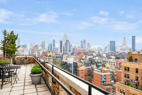 a view of a city with tall buildings