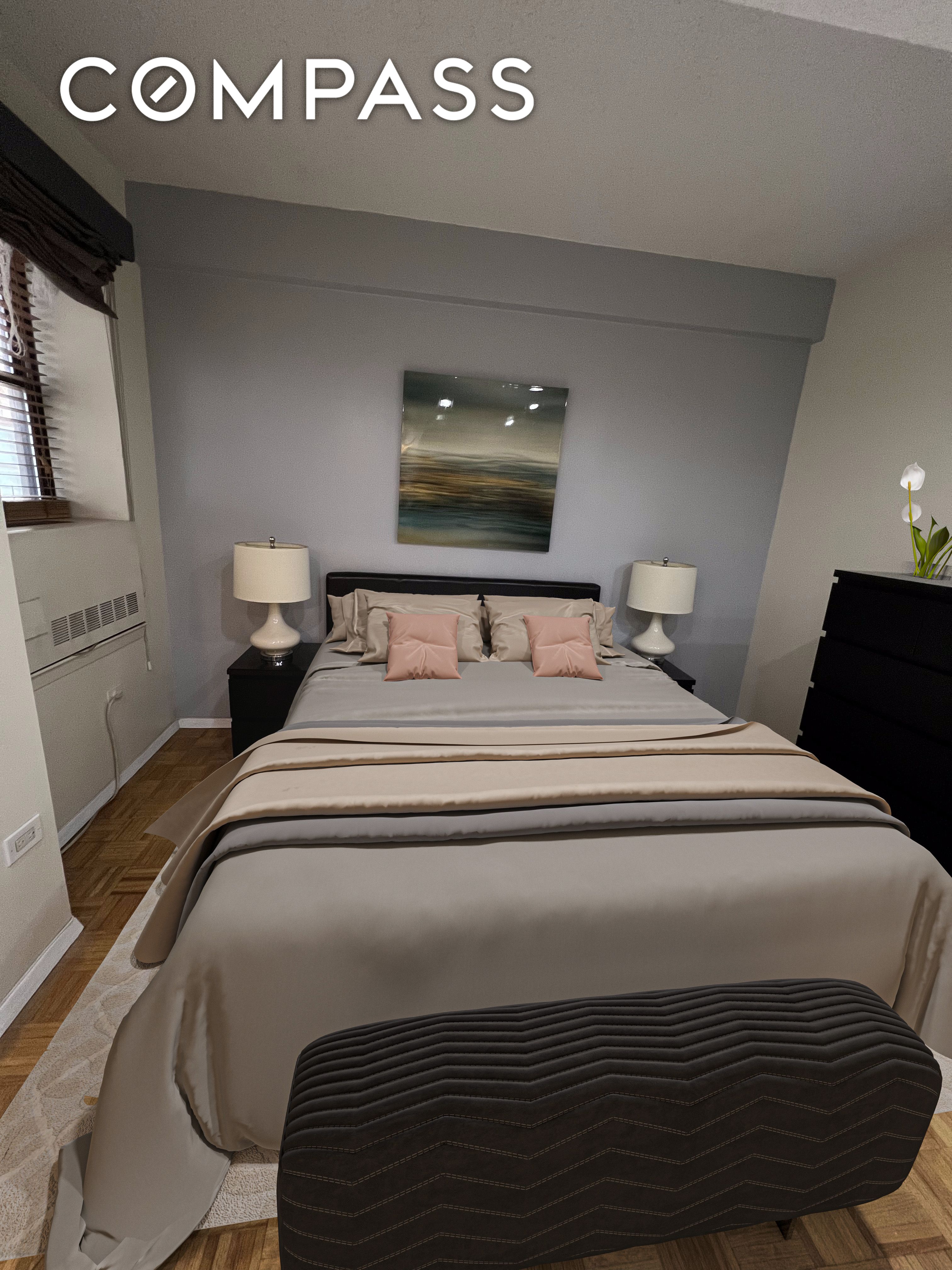 150 West 51st Street, Unit 1909 Manhattan, NY 10019 - Photo 6 of 12 a bedroom with a bed and a window