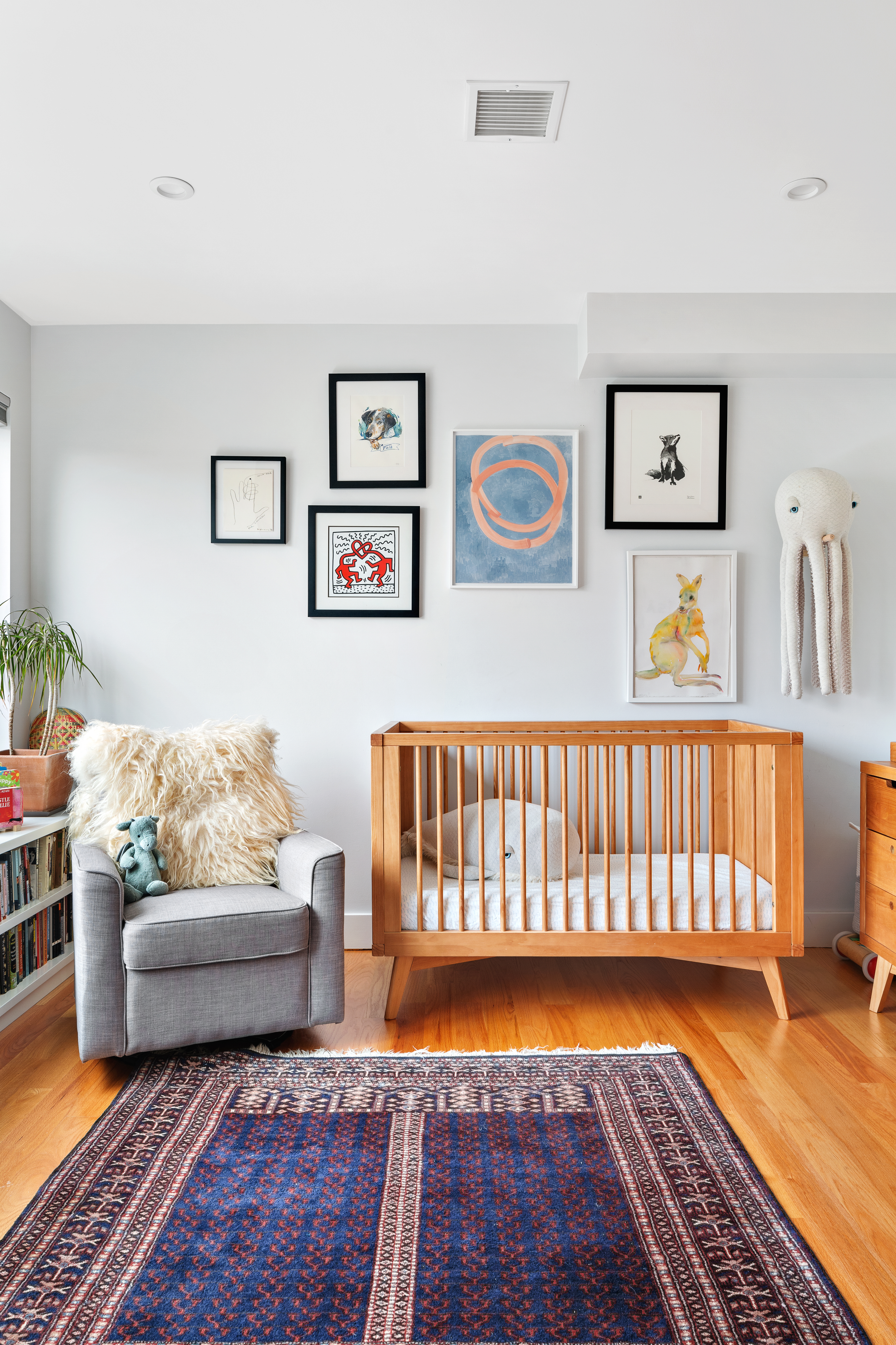 39 Madison Street, Unit 3B Brooklyn, NY 11238 - Photo 6 of 16 a bedroom with furniture and a wooden floor