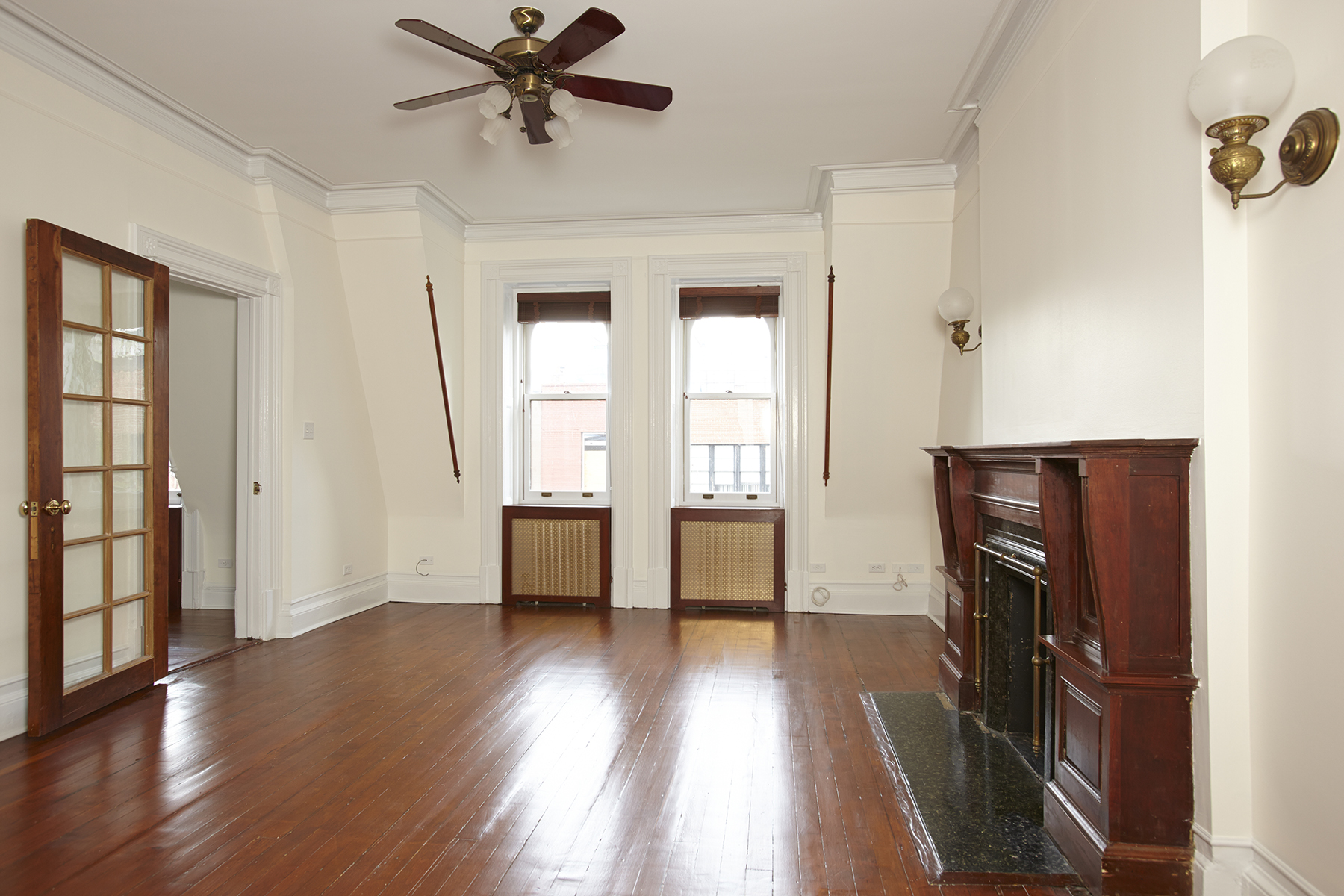 58 West 83rd Street, Unit 4A Manhattan, NY 10024 - Photo 5 of 9 wooden floor in an empty room with a window