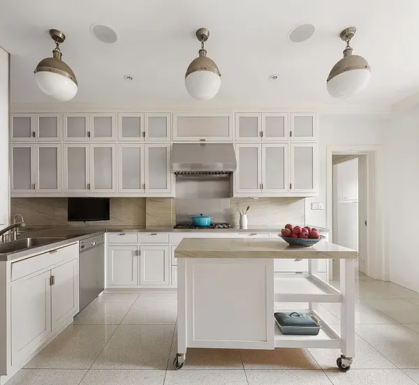 a kitchen with stainless steel appliances a sink stove and cabinets