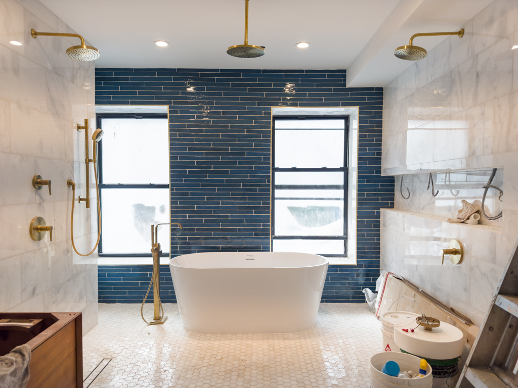 795 Quincy Street Brooklyn, NY 11221 - Photo 8 of 17 a bathroom with a bathtub and a sink