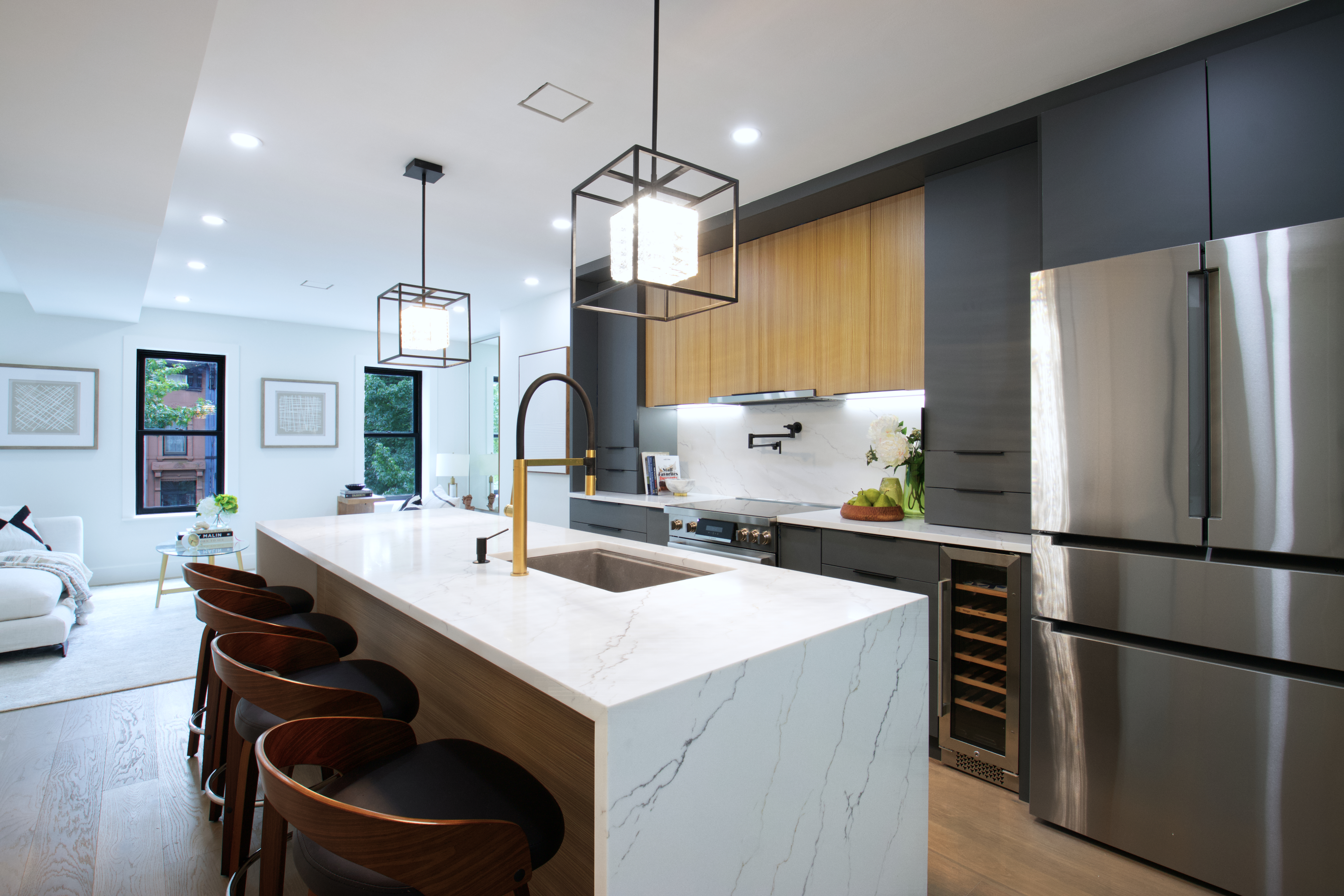 255 Macon Street Brooklyn, NY 11216 - Photo 16 of 36 a kitchen with sink cabinets and stainless steel appliances