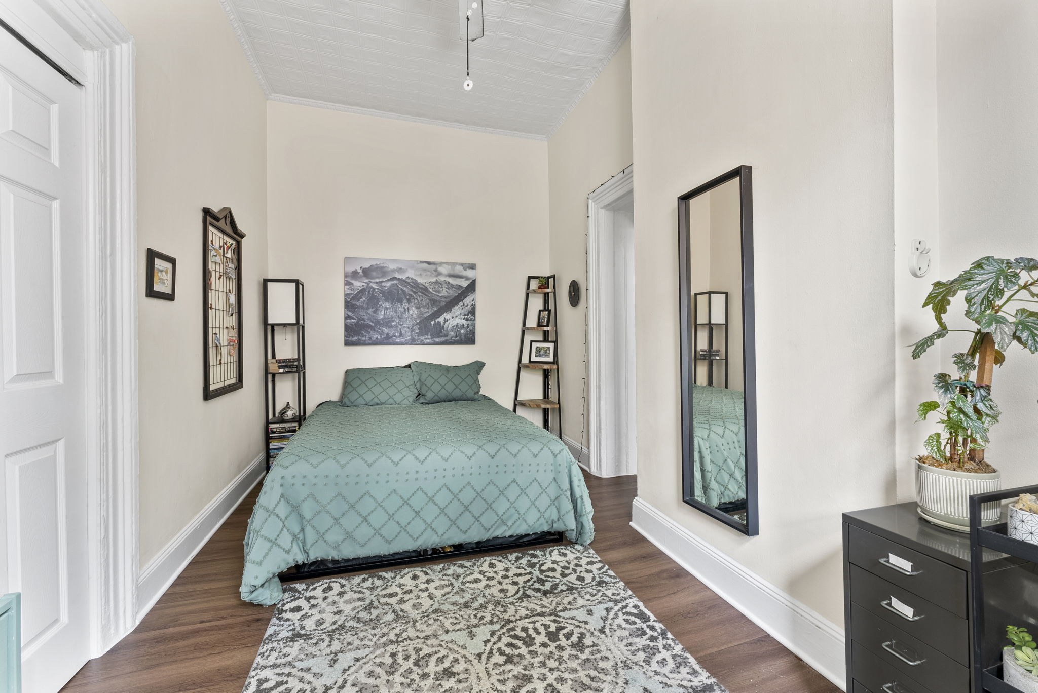 311 Henry Street, Unit 1 Brooklyn, NY 11201 - Photo 5 of 7 a bedroom with furniture and a rug