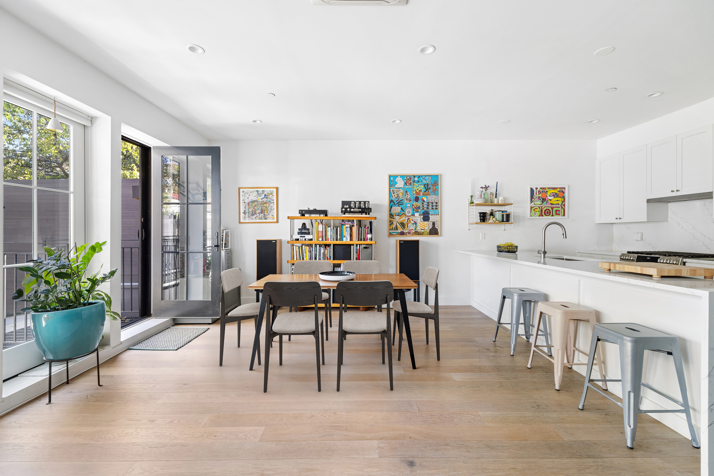 49 East 4th Street Brooklyn, NY 11218 - Photo 3 of 16 a view of a dining room with furniture window and wooden floor
