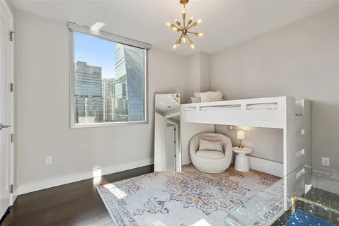a view of a livingroom with furniture and wooden floor