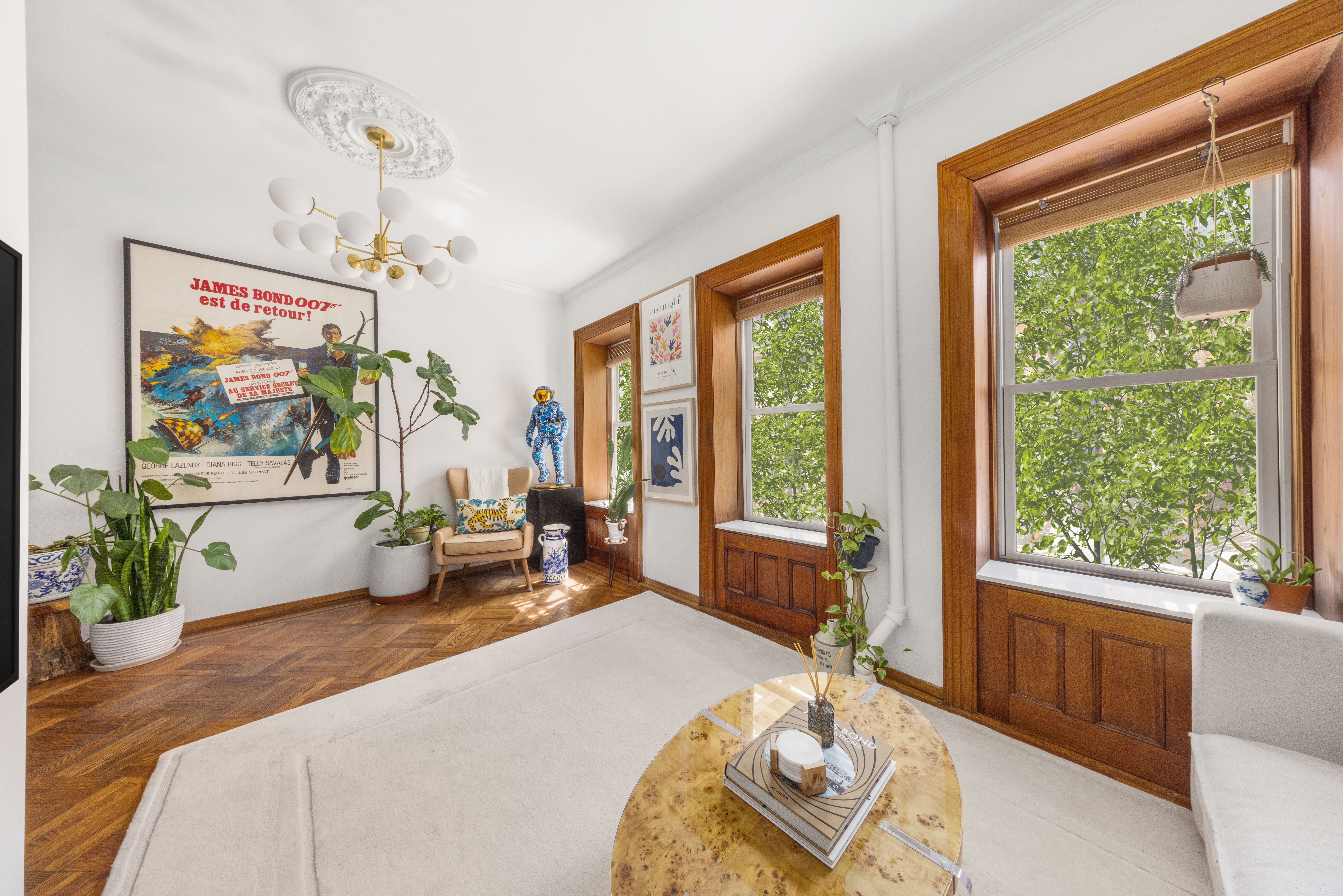 237 West 11th Street, Unit 2B Manhattan, NY 10014 - Photo 2 of 13 a bed room with a bed and a chair