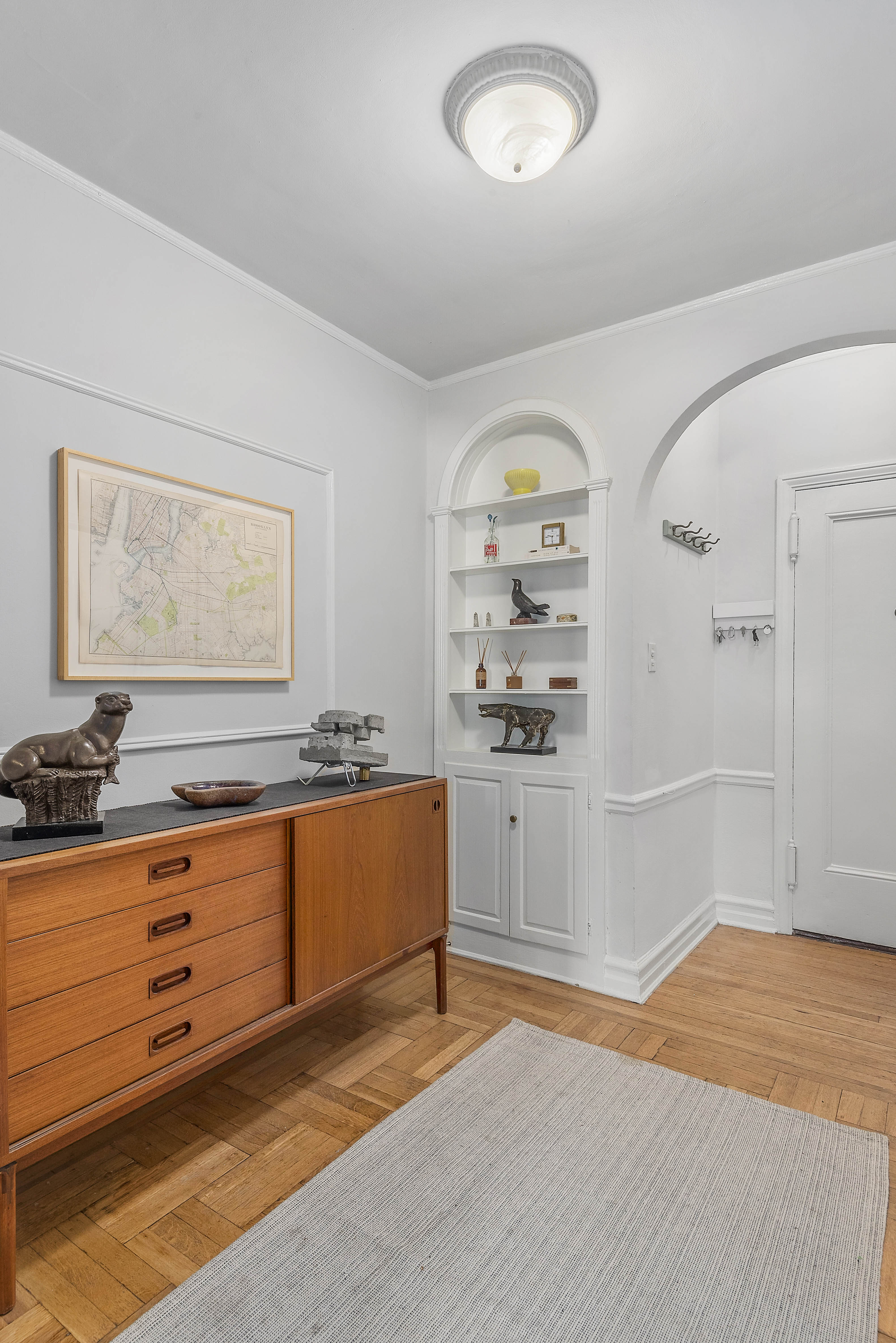 1409 Albemarle Road, Unit 1H Brooklyn, NY 11226 - Photo 6 of 9 a view of an empty room and window