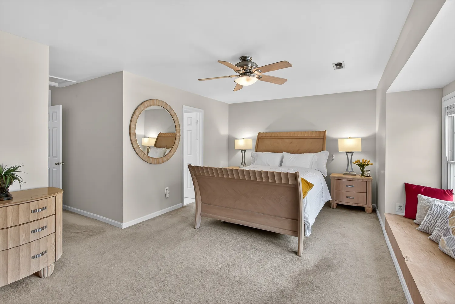 a bed room with a bed and a chandelier