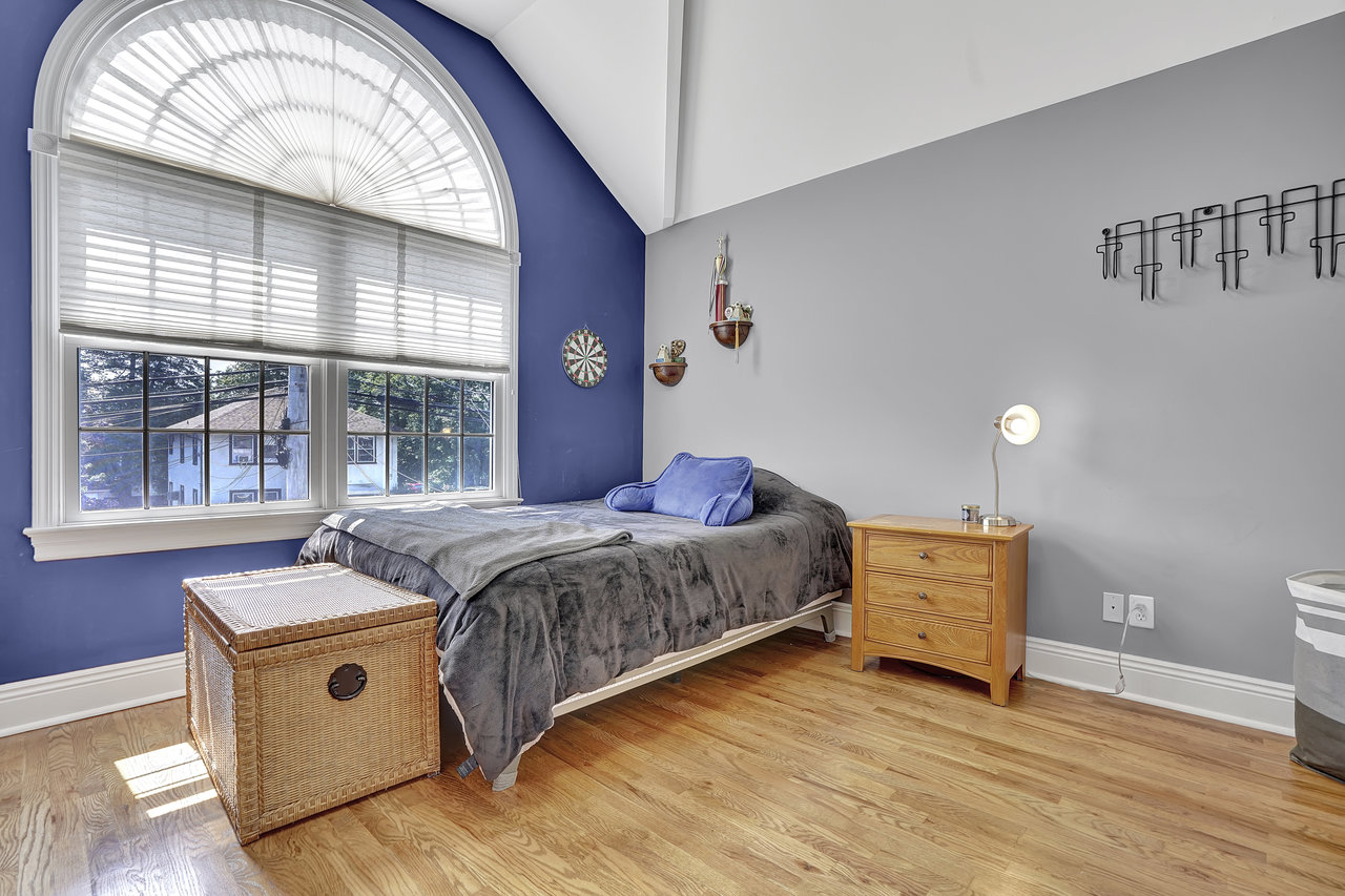 266 Feronia Way Rutherford, NJ 07070 - Photo 28 of 41 a spacious bedroom with a bed and a large window