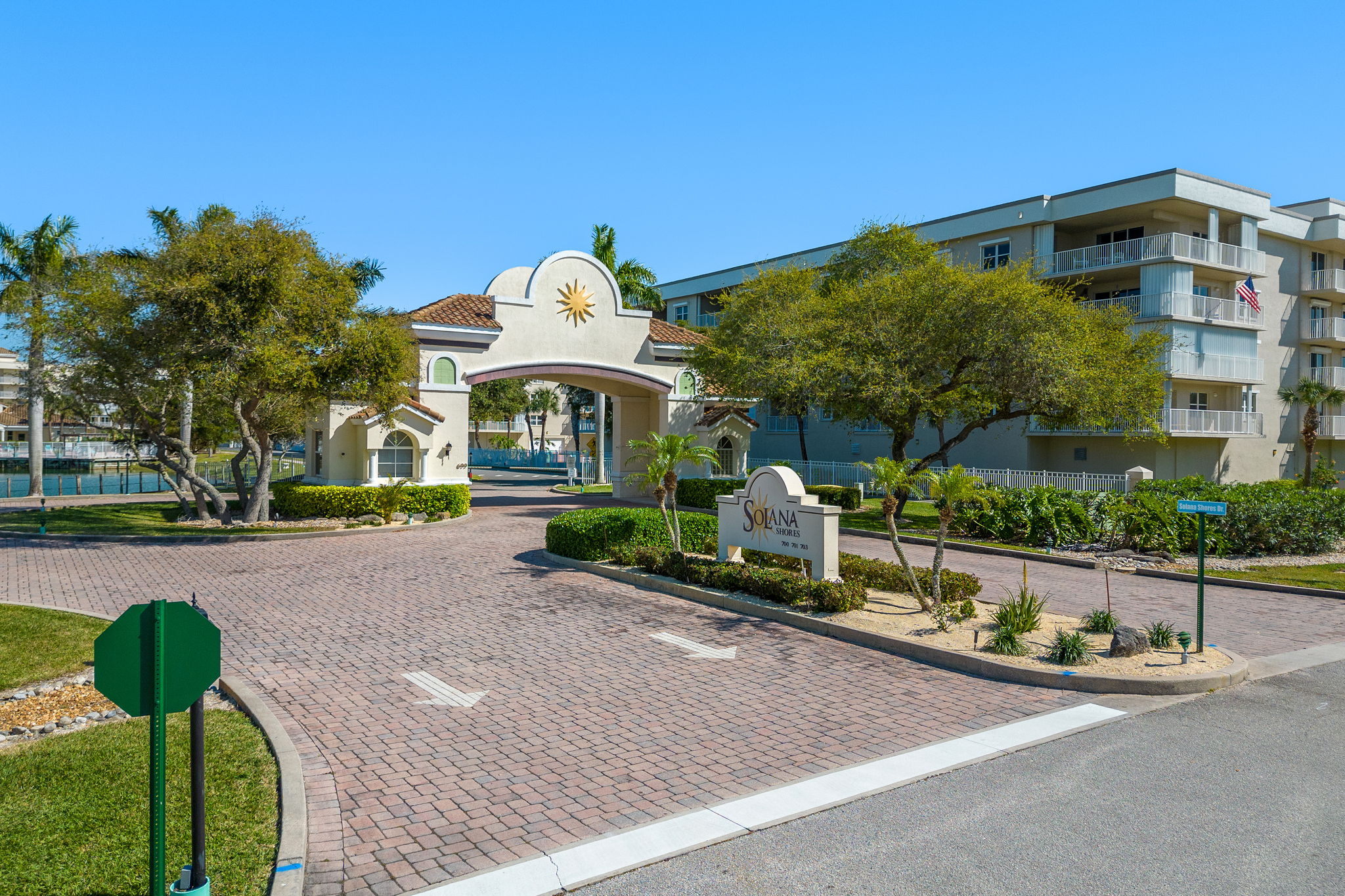 701 Solana Shores Drive, Unit 306 Cape Canaveral, FL 32920 - Photo 13 of 23 a front view of a house with garden