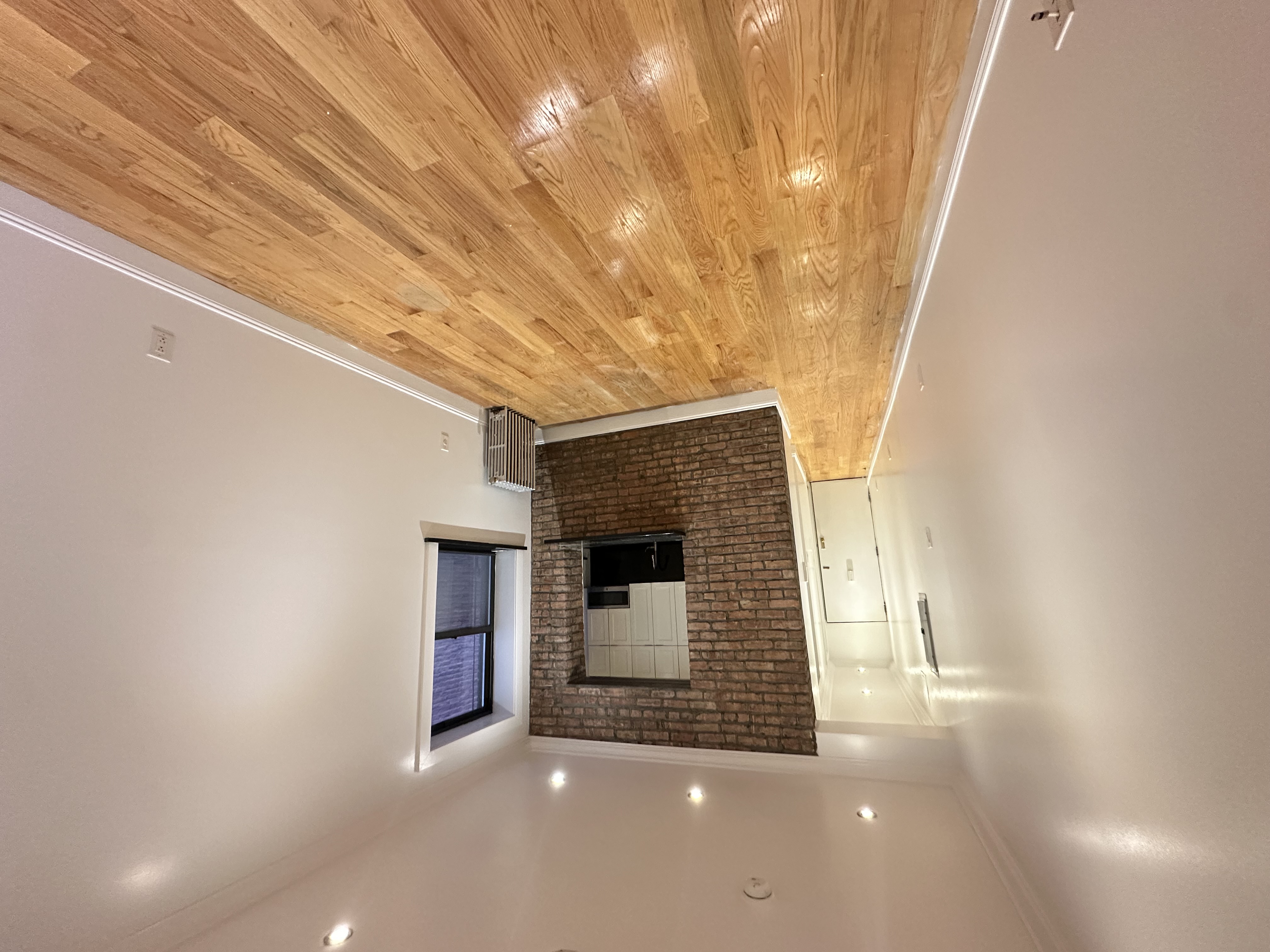 541 West 144th Street, Unit 4 Manhattan, NY 10031 - Photo 5 of 9 a bathroom with a sink and a shower