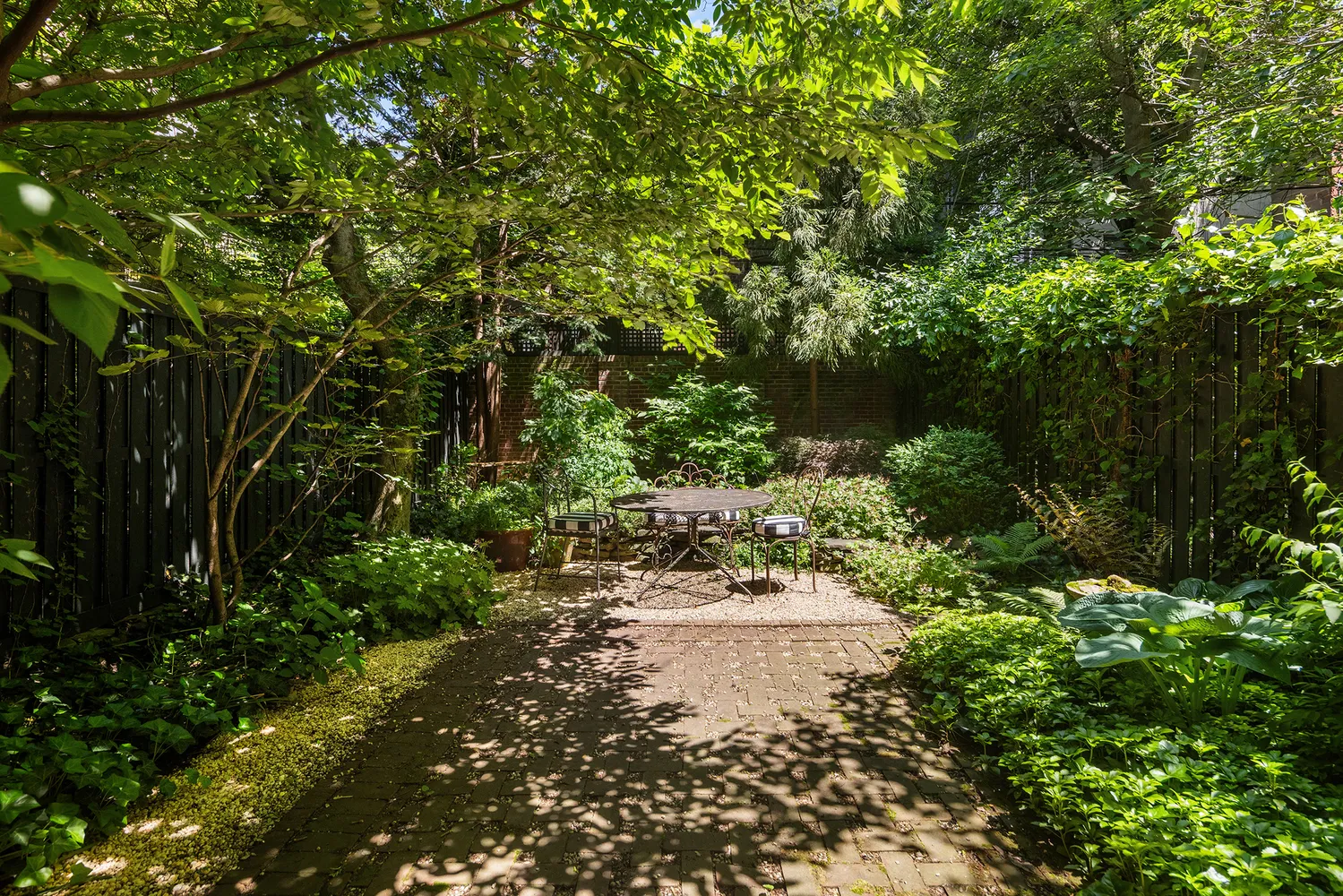 a spacious bedroom with a bed and a large window