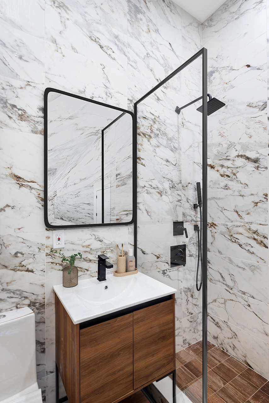185 Withers Street, Unit 4 Brooklyn, NY 11211 - Photo 8 of 12 a bathroom with a sink vanity and a mirror