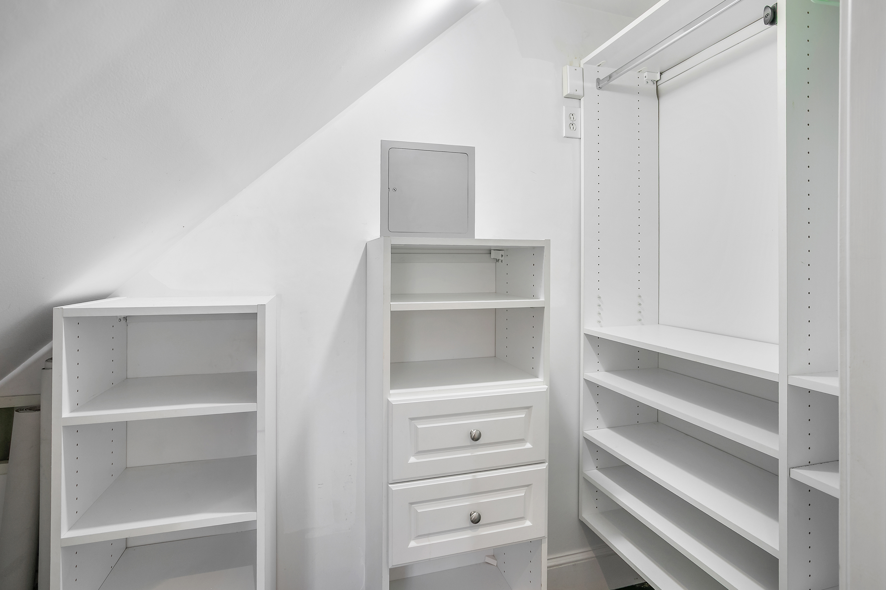 1832 Corcoran Street Northwest Washington, DC 20009 - Photo 22 of 29 a view of walk in closet with empty racks