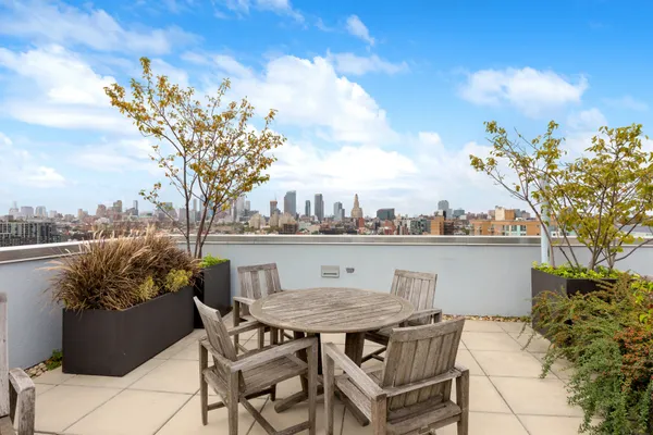 a view of a terrace with furniture