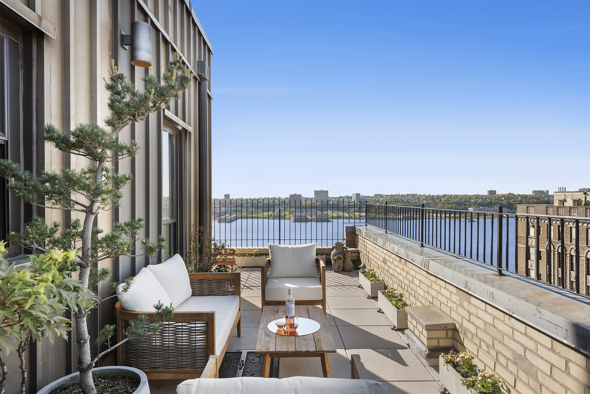 310 West 106th Street, Unit PH17B Manhattan, NY 10025 - Photo 1 of 9 a view of balcony with couch and chairs