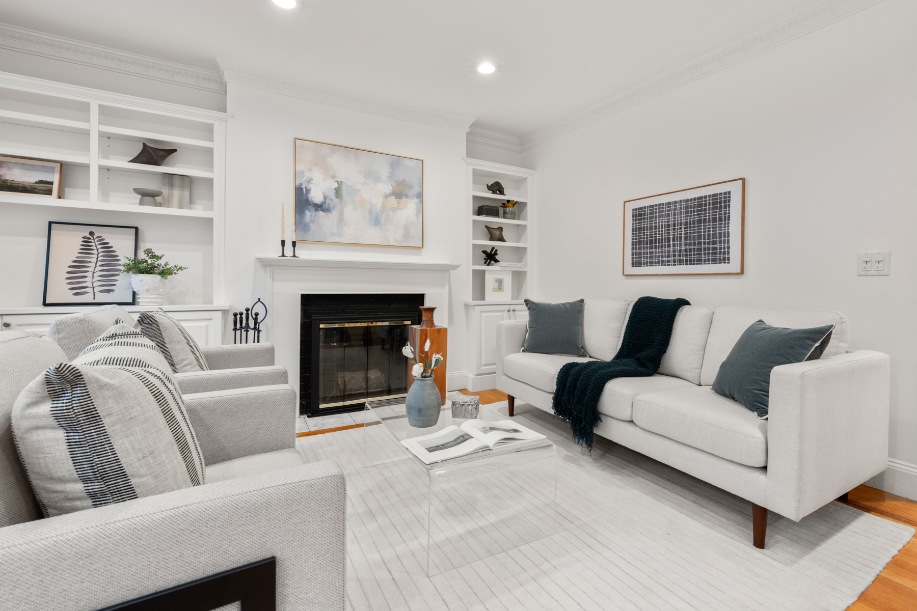 63 West Cedar Street, Unit 3 Boston, MA 02114 - Photo 2 of 17 a living room with furniture and a fireplace