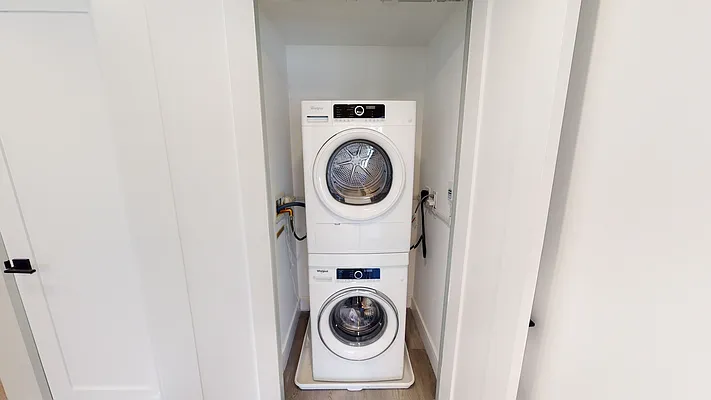 605 Hart Street, Unit 506 Brooklyn, NY 11221 - Photo 11 of 12 a utility room with dryer and washer