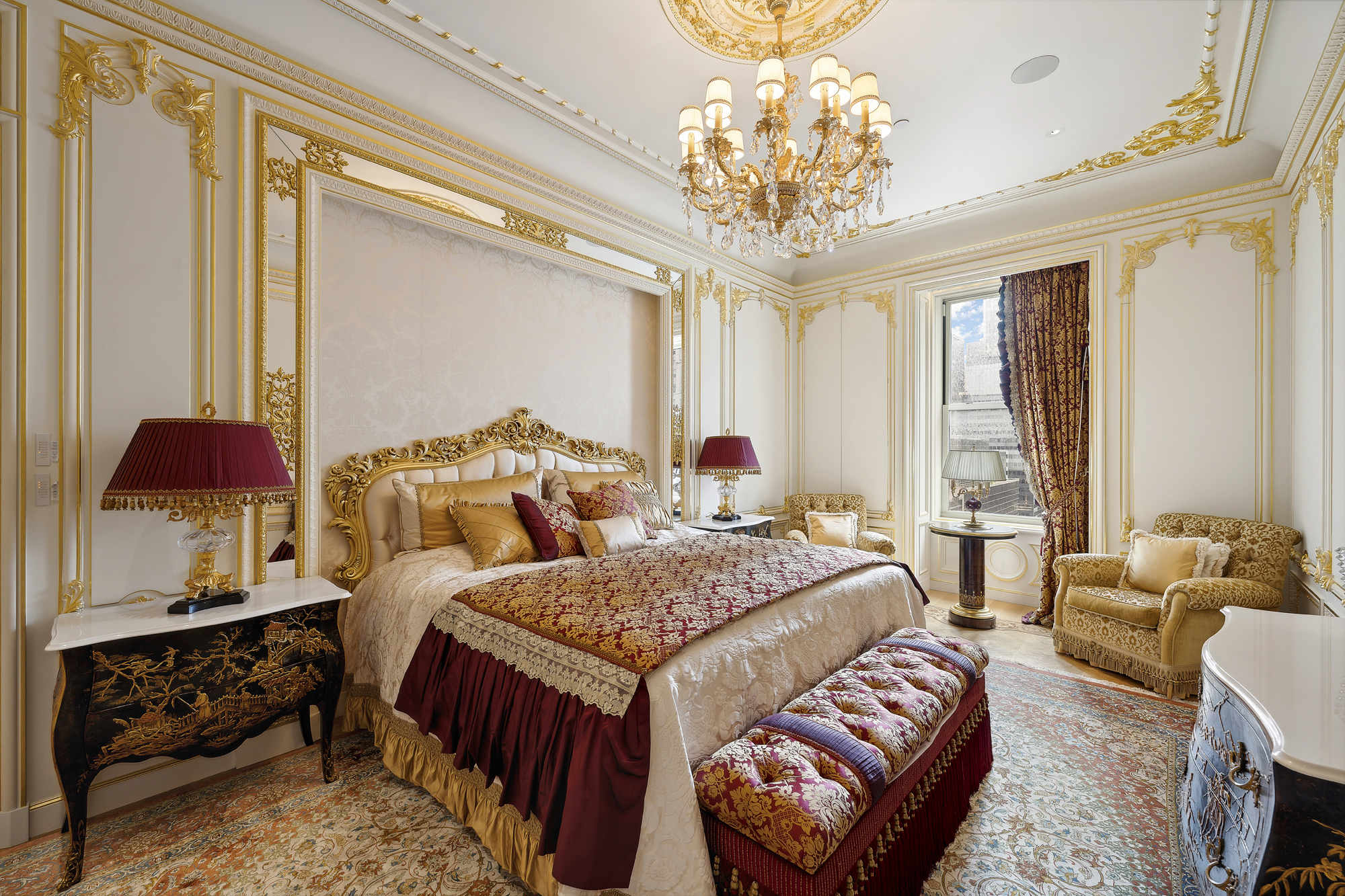 1 Central Park South, Unit 10071009 Manhattan, NY 10019 - Photo 19 of 28 a bedroom with a bed and a chandelier