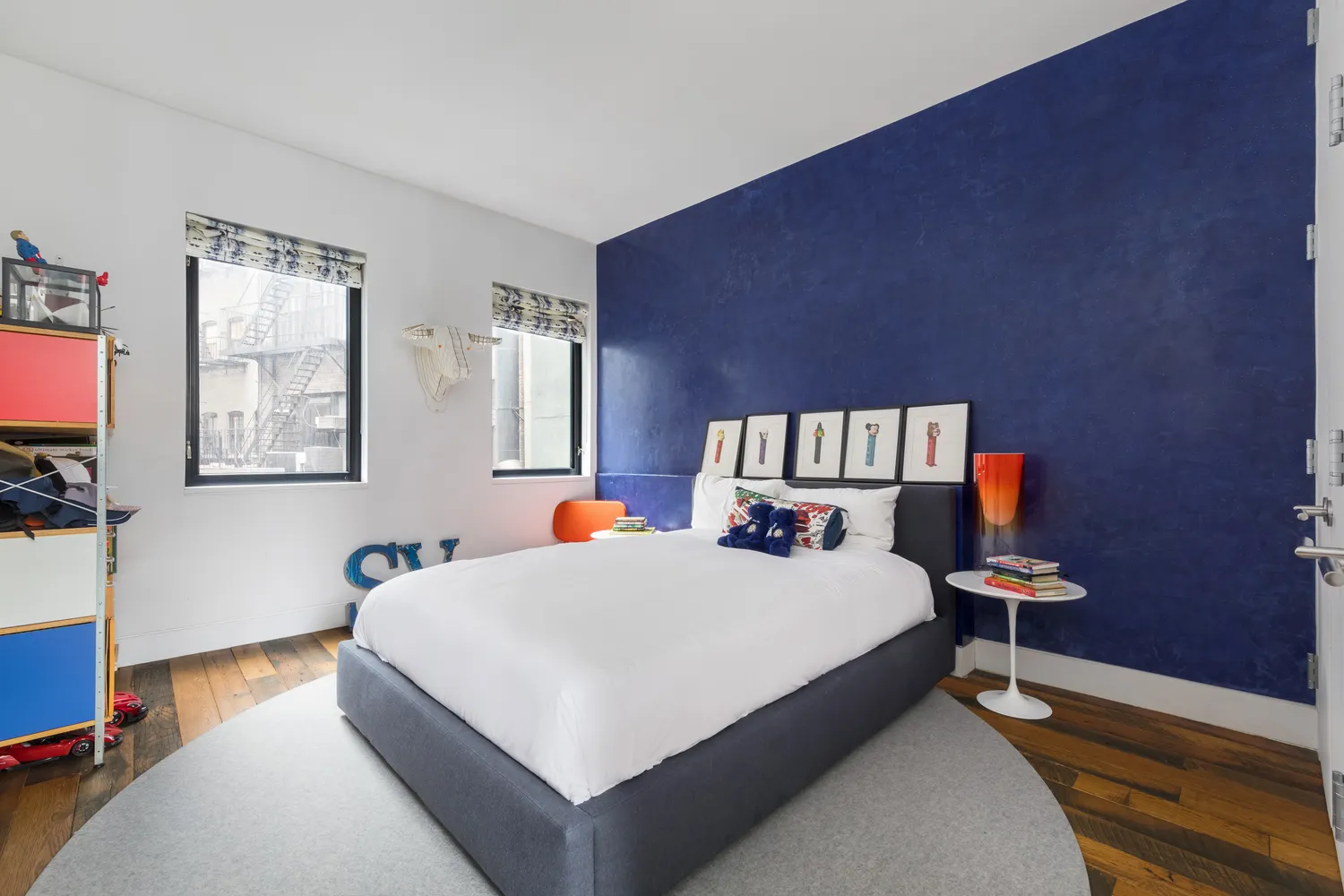 a bathroom with a bathtub a sink and a window