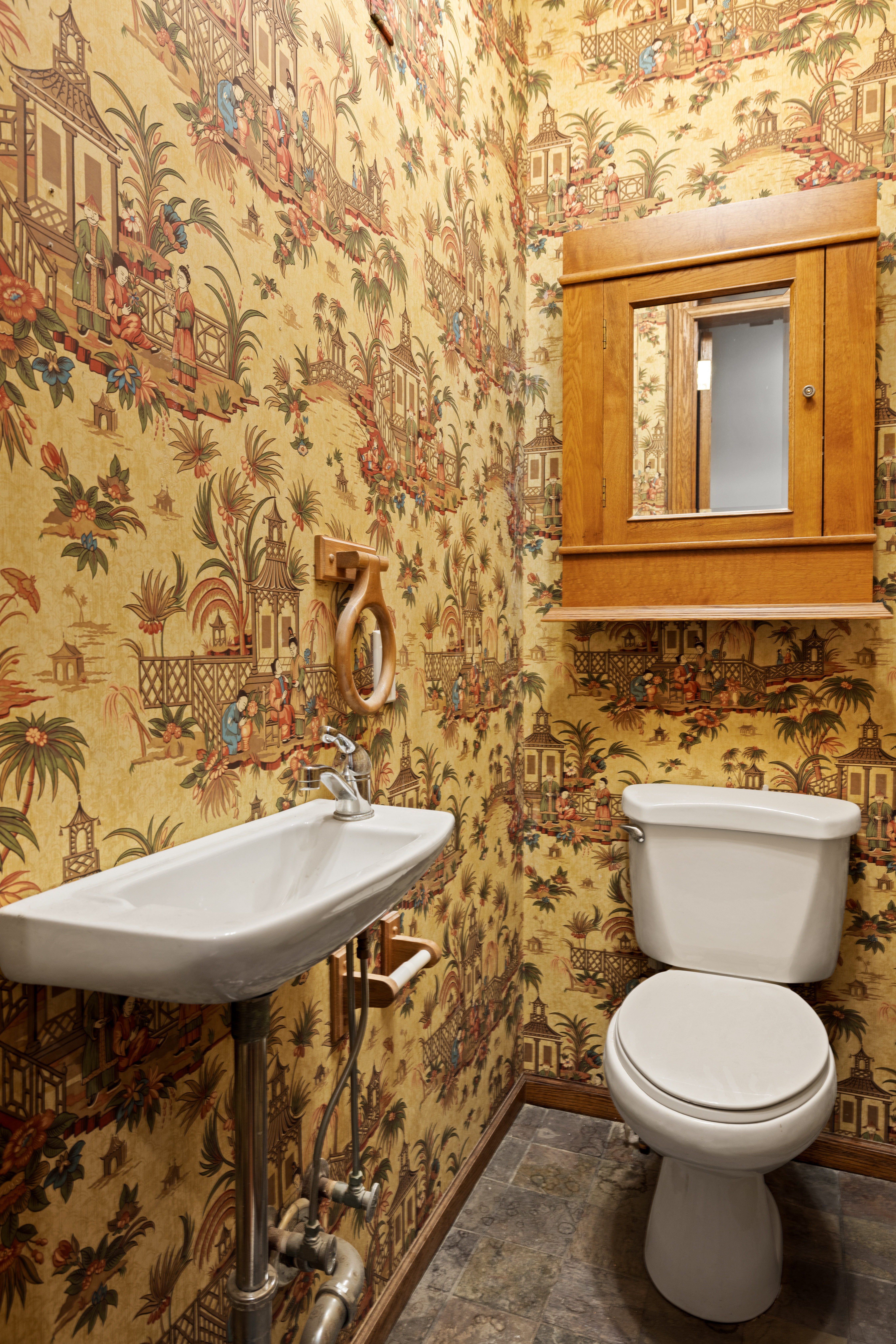 906 President Street, Unit 1 Brooklyn, NY 11215 - Photo 16 of 18 a bathroom with a toilet a sink and mirror
