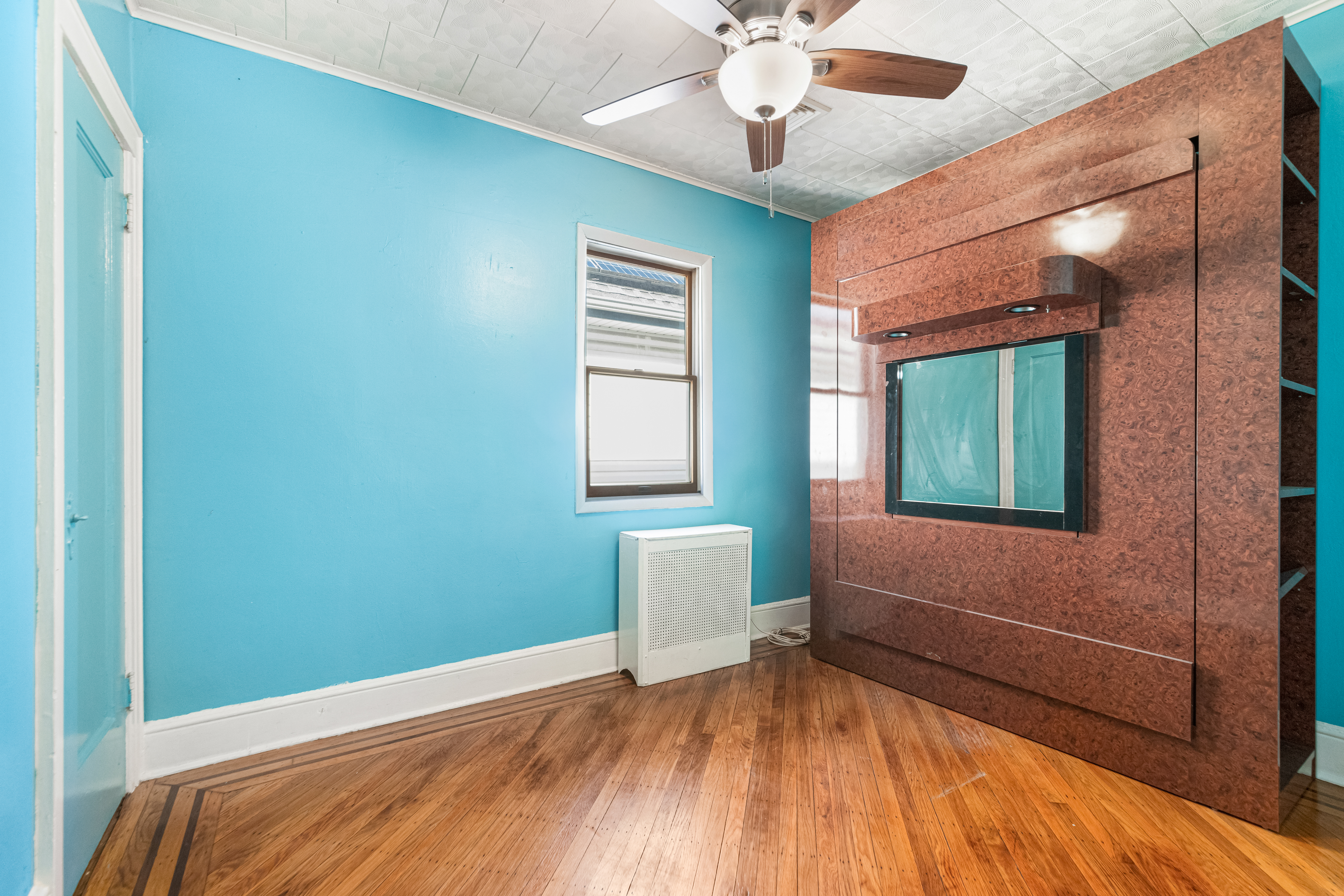 1874 Ryder Street Brooklyn, NY 11234 - Photo 12 of 20 a bedroom with a bed and a window